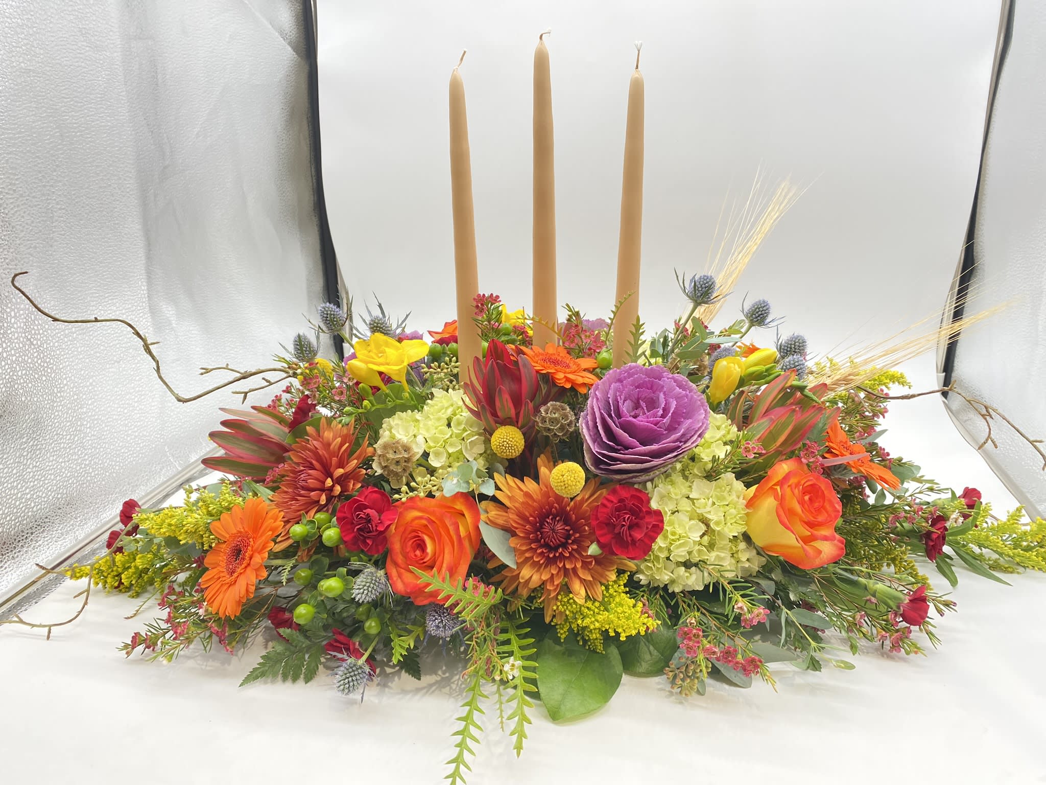 The Thankful Grande Centerpiece - This centerpiece is adorned with all your Fall favorite flowers and tones... The Grande Centerpiece is sure to wow!