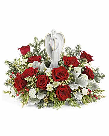 Blessed Serenity Funeral Bouquet - Embodying the spirit of Christmas, the Angel of Grace rests among a bed of red and white blooms, illuminating your special occasion with joy and light. Honor the season with a heartfelt arrangement of red roses, white miniature carnations, and button spray chrysanthemums. Enhanced with dusty miller, seeded eucalyptus, oregonia, cedar, Douglas fir, and white pine, it's presented with Teleflora's Angel of Grace Keepsake, offering a comforting touch of elegance.