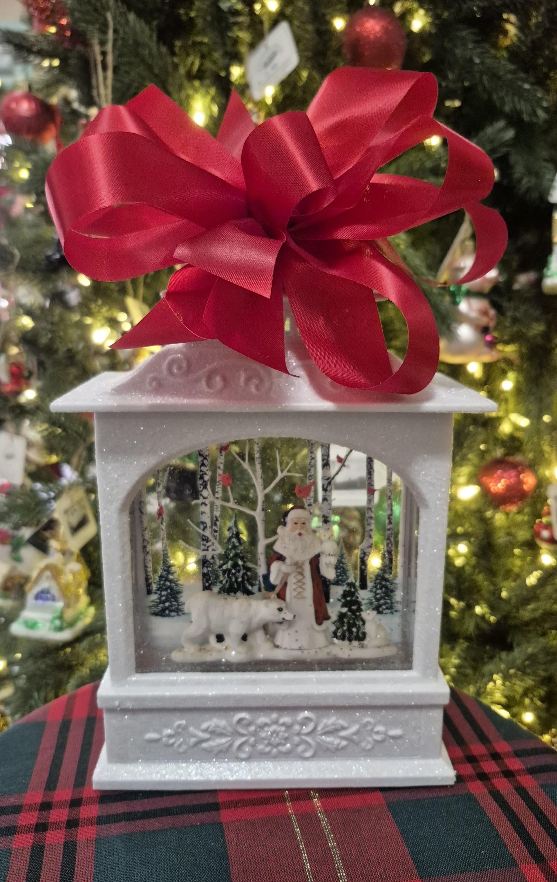 11&quot; WOODLAND SANTA AND POLAR BEAR LIGHTED WATER LANTERN - Made of Plastic Requires 3 C Batteries 6 Hour Timer Repeats Every 18 Hours Continuous Swirling Glitter, Gently Flip To Loosen Glitter, To Avoid Damage Do Not Shake Includes USB Cord Does Not Include USB Power Adapter Do Not Use With USB Power Adapter Exceeding 1.5 Amps