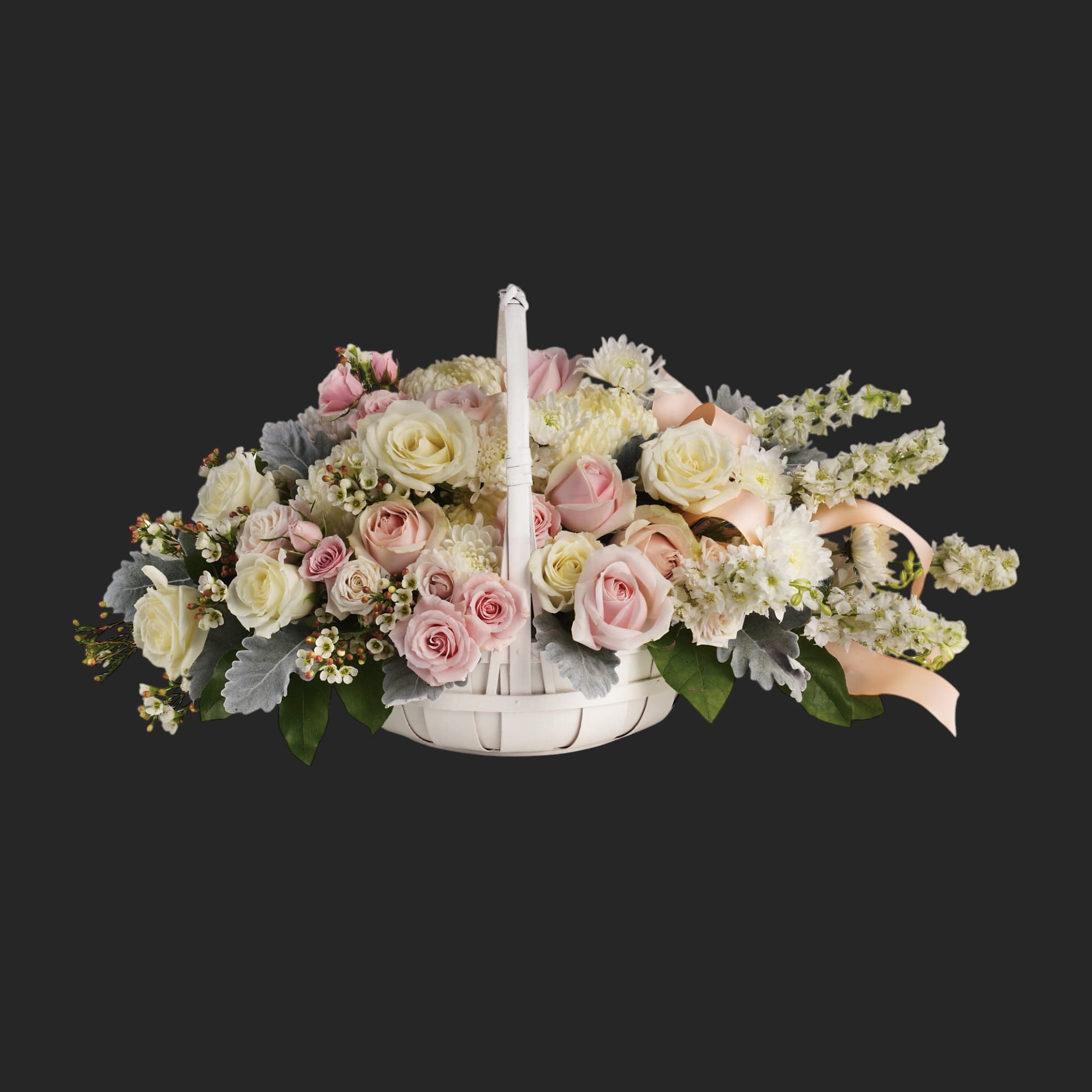 Dawn of Remembrance Basket by Teleflora - To offer comfort and consolation, these serene, softly colored roses and chrysanthemums are nestled in a round white basket with handle. Satin ribbon is threaded throughout to complement the soft look.  