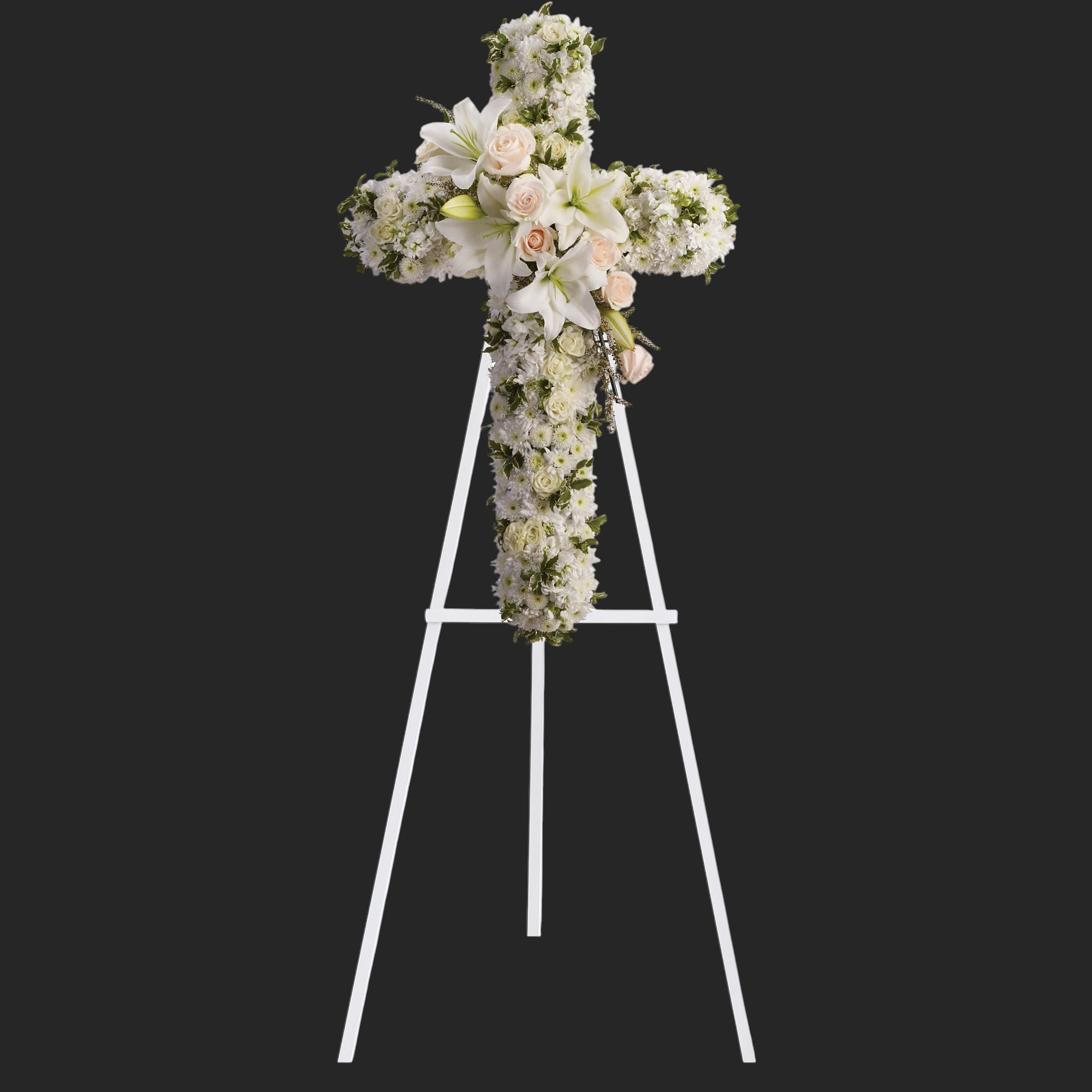 Divine Light by Teleflora - Your message of hope for eternal serenity is delivered ever so elegantly in this graceful cross. Your sincerity will be acknowledged by all who are present.  