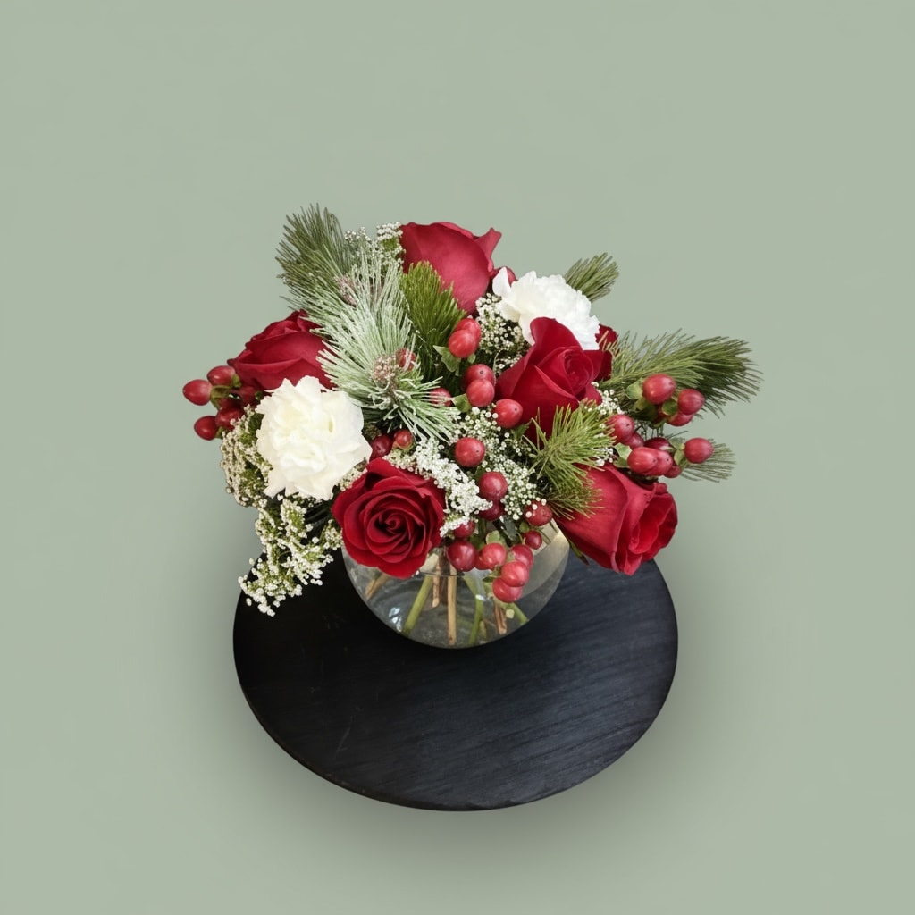 Festive Friday Centerpiece  - What’s the best part of Friday? Flowers. That’s the answer. If you’re skeptical, let us prove it to you. Order the Festive Friday arrangement today and add a whole new, flowery dimension to your weekend.
