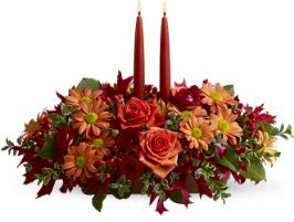 thanksgiving-centerpiece - thanksgiving-centerpiece-and-table-decoration/fall-themed-flower-arrangement-thanksgiving-centerpiece-red-and-brown-plaid-fabrics-decoration-two-yellow-candle-light-as-accent/