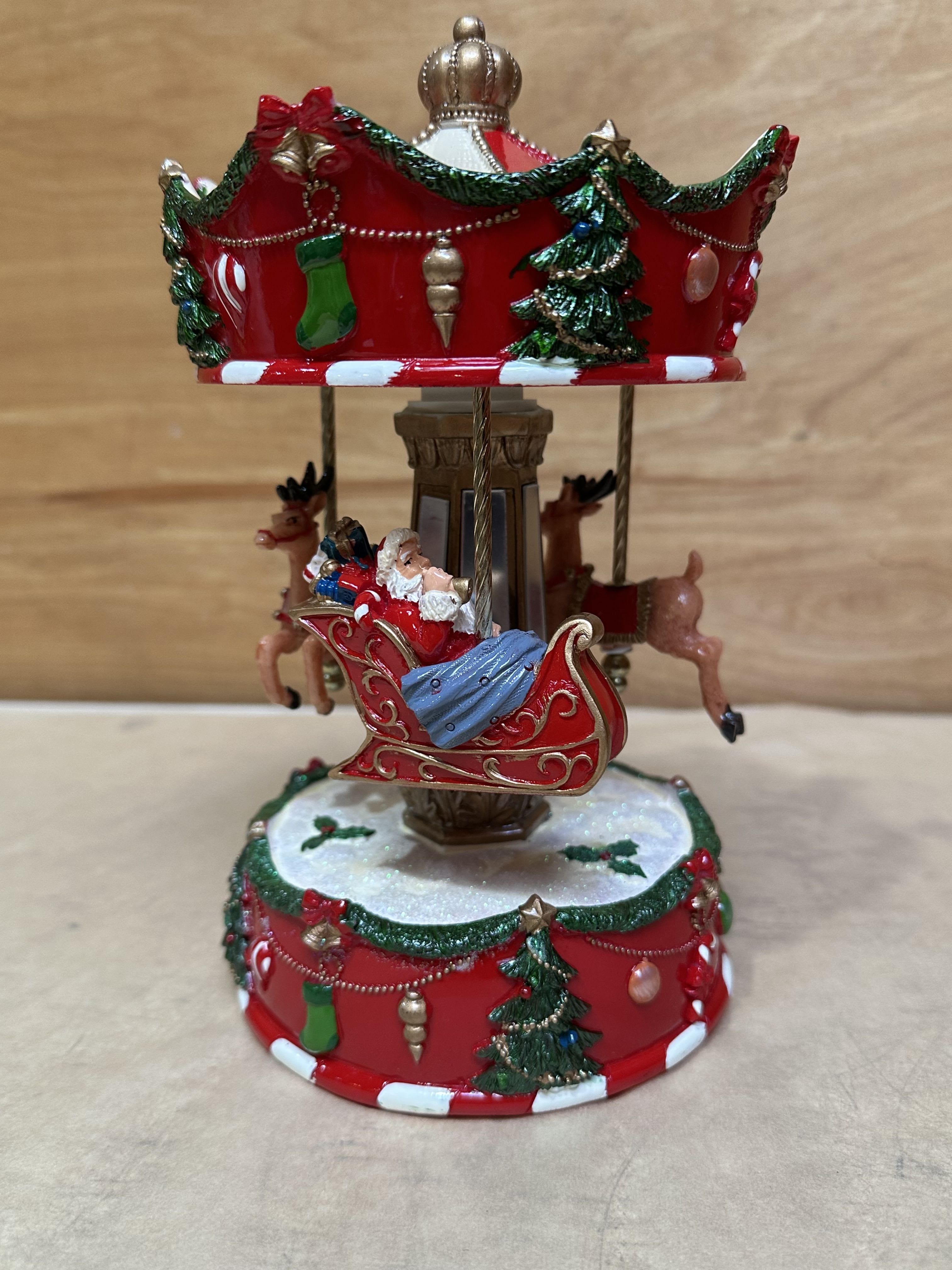8.5&quot; Animated Musical Santa's Sleigh Carousel - 8.5&quot; ANIMATED MUSICAL SANTA'S SLEIGH CAROUSEL Multicolor Made of Polyresin; Polyresin Measures 5&quot; D X 8.5&quot; H Wind Up Plays &quot;Santa Claus is Coming to Town&quot;