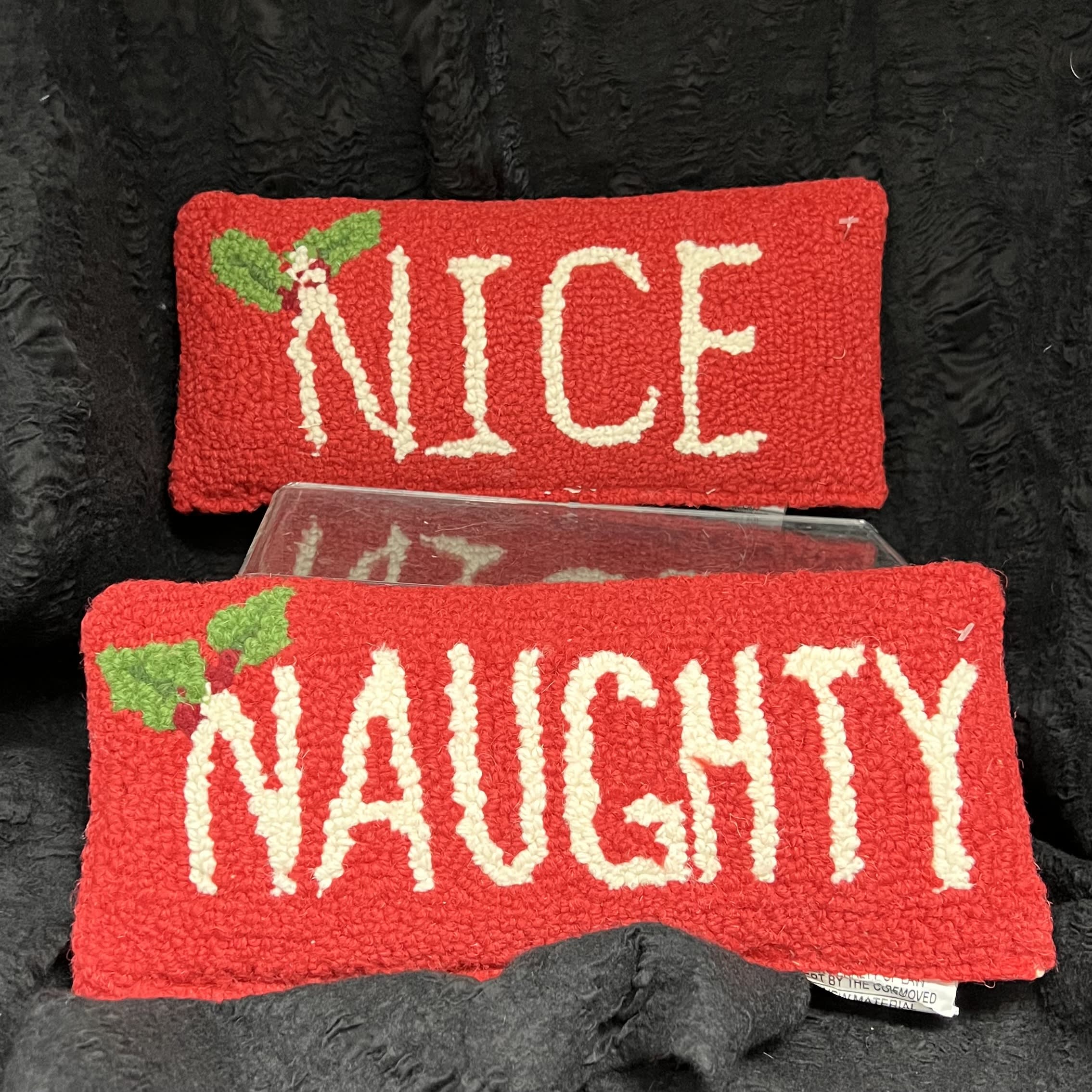Nice or Naughty - Two beautifully crafted hooked wool pillows are depicting Naughty and Nice in Holiday colors. Dimensions:  12&quot;x 5&quot; each
