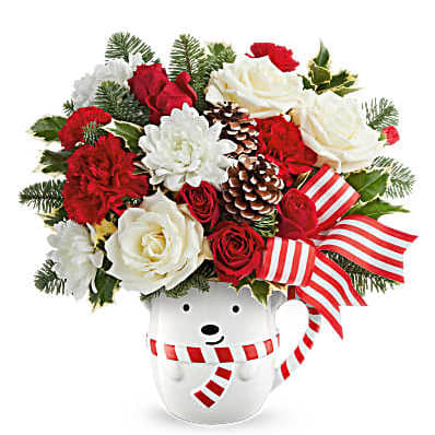 Send a Hug Cozy Cub Wish Bouquet - Send warm holiday hugs with Send a Hug Cozy Cub Wish Bouquet! Festive red blooms and fresh greens arrive in an adorable bear mug-perfect for Christmas cheer and cozy winter gifting. Send a Hug Cozy Cub Wish Bouquet includes red spray roses, red carnations, red miniature carnations, and white cushion spray chrysanthemums. Accented with noble fir and variegated holly in a Send a Hug Cozy Cub Wish Mug