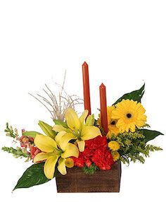 Vibrant &amp; Glowing Centerpiece  perfect for family reunion $65.00, $75.00, $90.00 Shown at $75.00 - Substitution Policy In some instances, our photo may represent an overall theme or look and include a one-of-a-kind vase which cannot be exactly replicated.  Although the actual bouquet may not precisely match the photo, its temperament will. Occasionally, substitutions of flowers and/or containers happen due to weather, seasonality and market conditions which may affect availability. If this is the case with the gift you’ve selected, we will ensure that the style, theme and color scheme of your arrangement is preserved and will only substitute items of equal value or higher value.  If any design elements are of major importance to your order, please include them in the florist instructions at checkout or contact us to ensure availability.