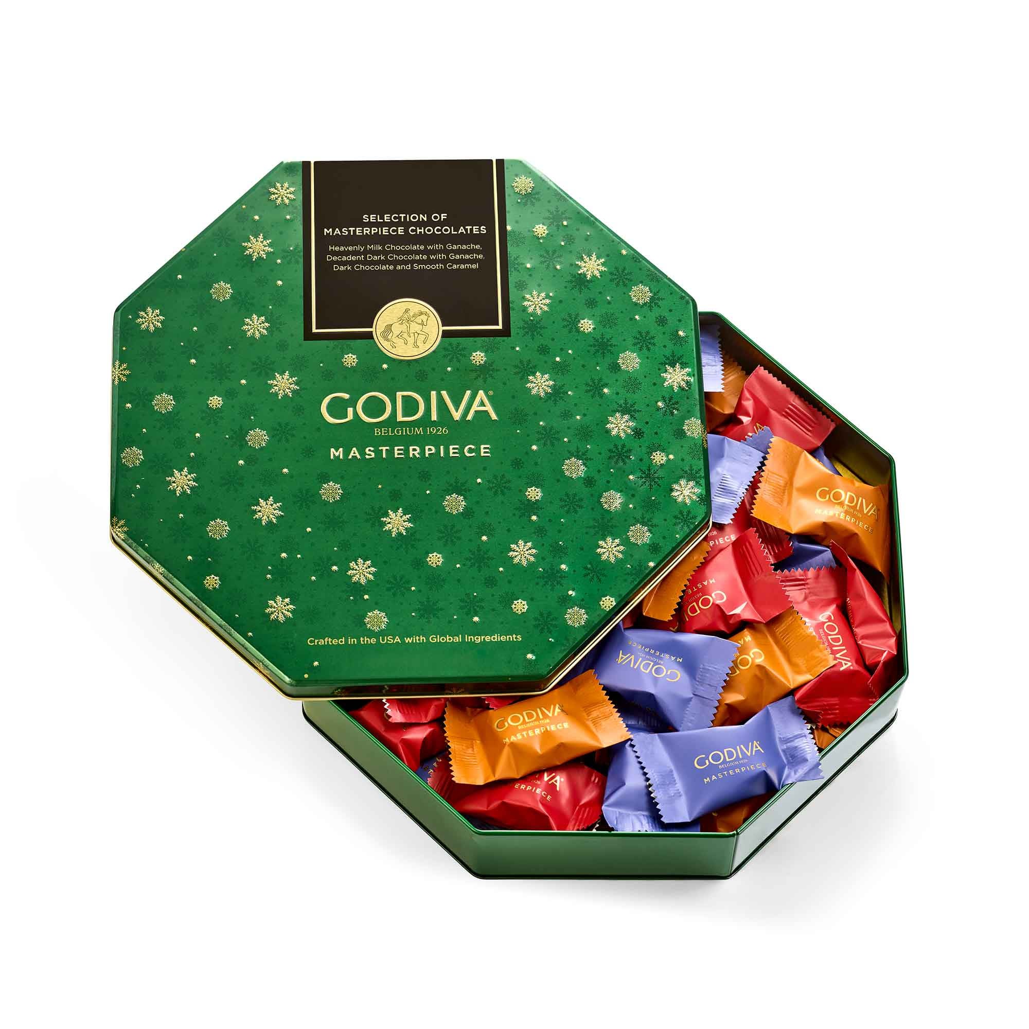 Godiva Christmas Tin -  Festive Godiva Christmas Tin  Celebrate the Spirit of Aloha this holiday season with a luxurious touch! Enjoy individually wrapped Godiva chocolates beautifully presented in a festive Christmas tin—perfect for gifting, sharing, or savoring with loved ones.  Each silky-smooth piece of Godiva chocolate delivers world-class flavor and indulgence, making this collection a timeless favorite for the holidays.  Product Highlights   Assorted individually wrapped Godiva chocolates   Presented in a beautiful reusable Christmas tin   A perfect gift for family, friends, and coworkers   Available for local Honolulu delivery or Oahu pickup   Ideal for holiday gifting, corporate presents, or stocking stuffers  Why They’ll Love It  Premium Belgian chocolate quality that melts in every bite  Festive, elegant packaging that makes any celebration sweeter  A thoughtful way to share the warmth and joy of the season  Perfect For  Honolulu Christmas gifts and Hawaii holiday treats  Corporate thank-you gifts and employee appreciation  Chocolate lovers who appreciate indulgence and beauty