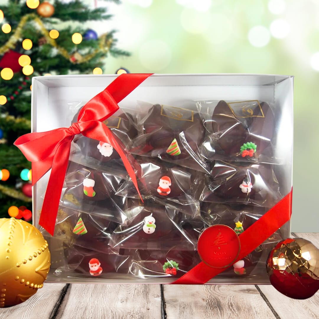 Chocolate Covered Fortune Cookies gift set  - Chocolate-Dipped Christmas Fortune Cookies  A fun and festive addition to your Christmas parties and holiday gatherings! Enjoy one dozen chocolate-dipped fortune cookies, each topped with a colorful Christmas sugar emblem and individually wrapped for freshness and easy sharing.  These sweet treats bring both flavor and fun — perfect for spreading holiday cheer and discovering your fortune this season!  Product Highlights   One dozen chocolate-dipped fortune cookies   Each cookie decorated with a festive Christmas sugar emblem   Individually wrapped for freshness and easy gifting   Perfect for holiday parties, stocking stuffers, or dessert tables   Available for Honolulu delivery and Oahu pickup  Note: Christmas ornaments shown in photo are not included.  Why They’ll Love It  A unique, interactive treat that delights guests of all ages  Delicious combination of crunchy cookie + creamy chocolate  Adds a touch of fun and sweetness to any Christmas celebration  Perfect For  Honolulu Christmas parties and Hawaii holiday gifts  Corporate events, family gatherings, and Secret Santa surprises  Anyone who loves a festive twist on classic fortune cookies!