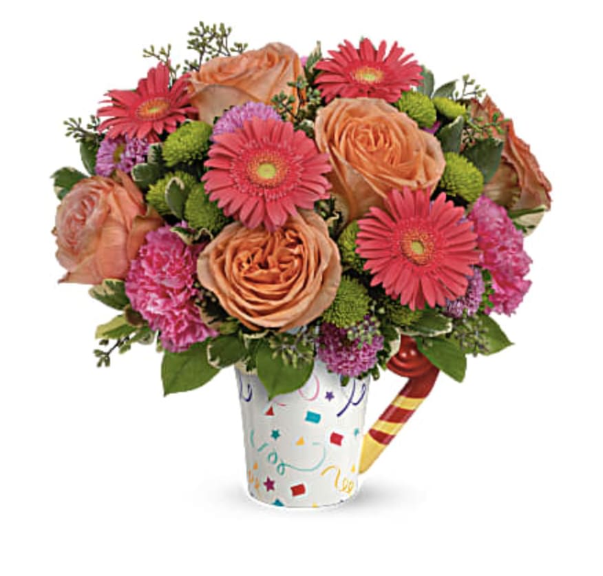 Time To Celebrate Bouquet - Bursting with birthday cheer! This colorful, confetti-covered ceramic mug brightens their special day with beautiful blooms, then cheers them up as a food-safe mug for sipping yummy drinks all year long! This fun bouquet features peach roses, pink matsumoto asters, green button spray chrysanthemums, dark pink carnations, variegated pittosporum, lemon leaf and seeded eucalyptus. Delivered in Teleflora's Cheers to You mug. Orientation: All-Around