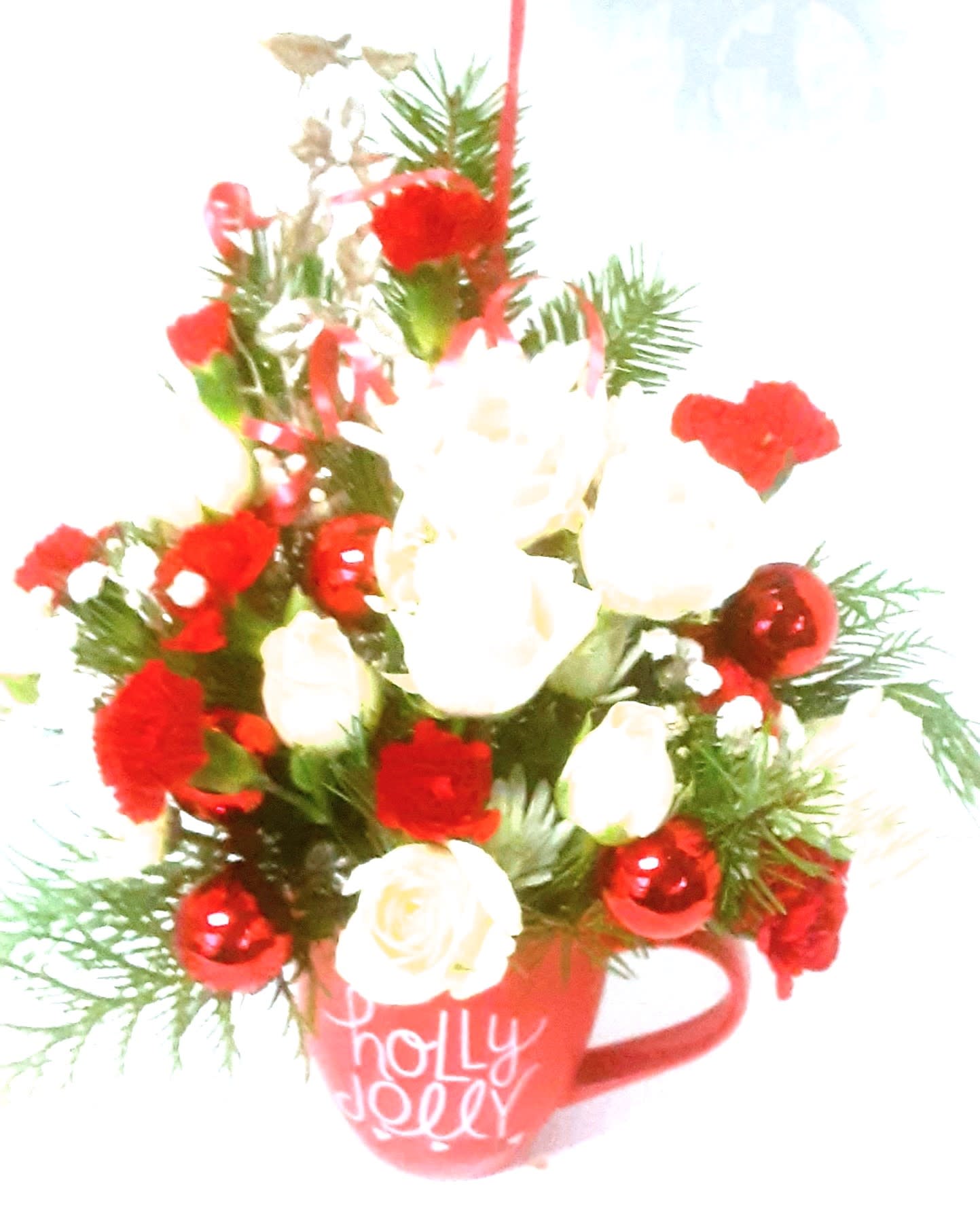 Holly Jolly Mug  - A holiday mug of miniature roses and carnations with holiday greenery, accented with glittering ornaments. Perfect as a holiday gift ,birthday ,or other December occasion!
