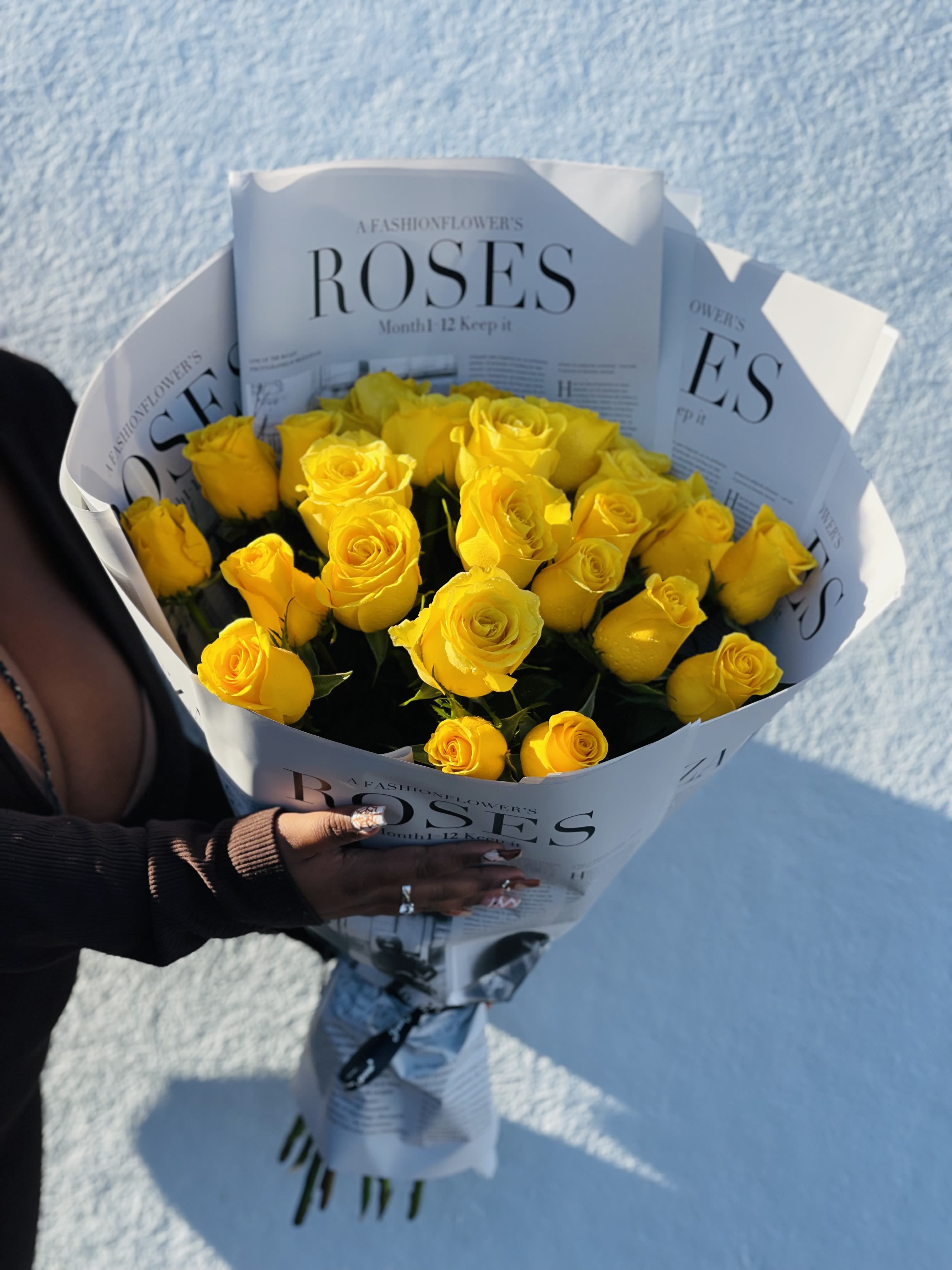 Golden Aura  - 24 yellow roses A yellow rose bouquet is a beautiful and cheerful arrangement that symbolizes friendship, joy, and new beginnings .