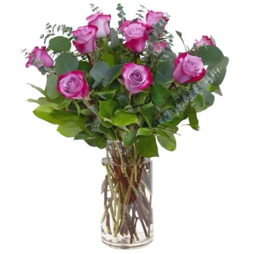 Dozen Purple Roses - Deeply 12 amazing lavender with hot pink tips. These Roses are breathtaking!!! Professionally designed with superior quality while using lush greenery. Greenery and vase will vary due to availability. 