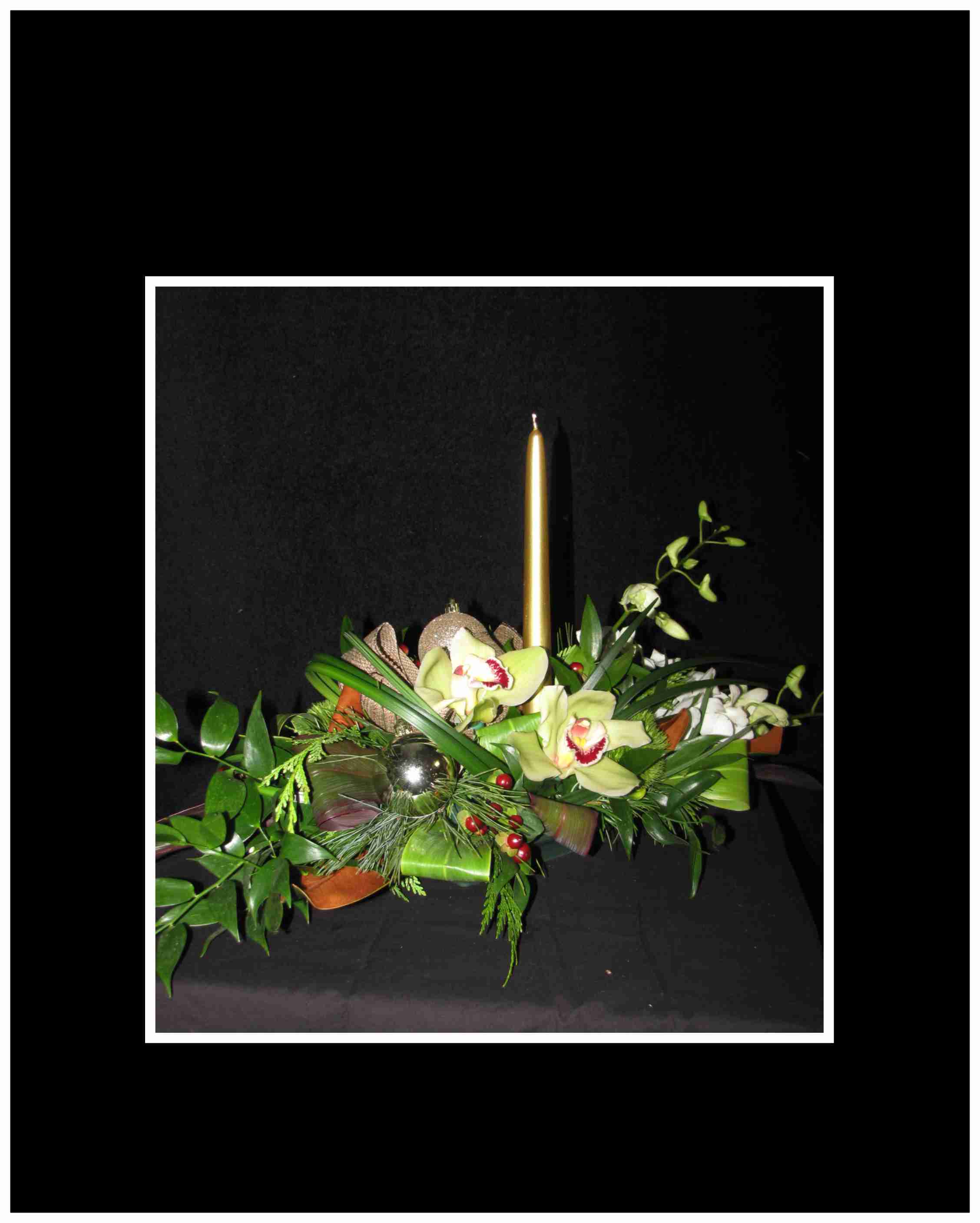 Seasonal Lights Center Piece - Christmas greenery surrounds this wonderful center piece that includes white dendrobium orchids, cymbidium orchids, lotus pod  and gold accents and a Danish dripless candle. Always fresh for Christmas.   Approx. 22 x 15