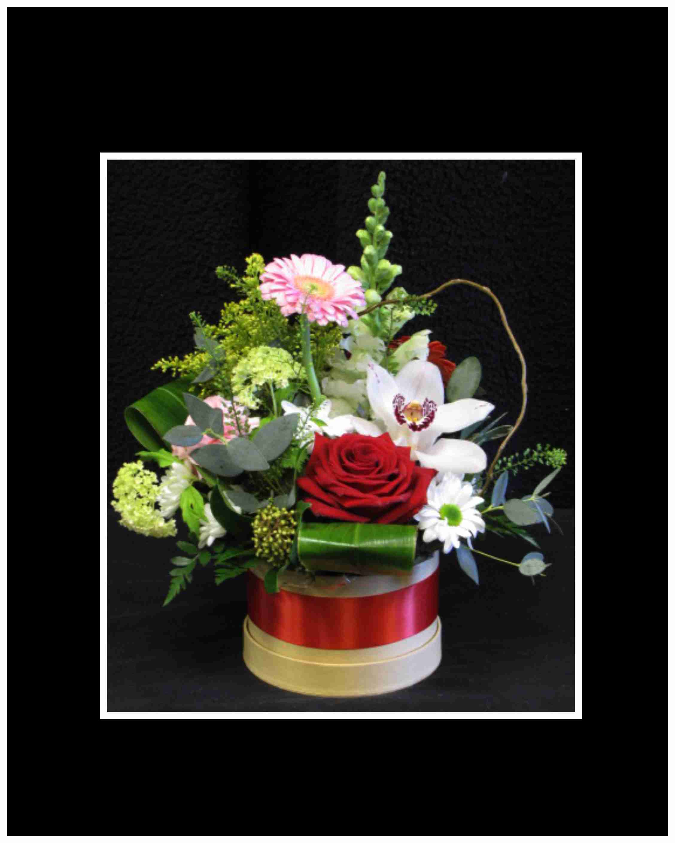 Garden Party in a Box Arrangement - This arrangement is unique to our shop, everything is arranged in a&nbsp;gift box that includes mixed colors, and a mix of flowers to make a fabulous floral arrangement.  Approximately 10" x&nbsp; 10"