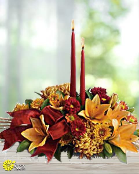 Fall Harvest centerpiece - An elegant centerpiece with 2 candles and a rich mix of orange and fall colors