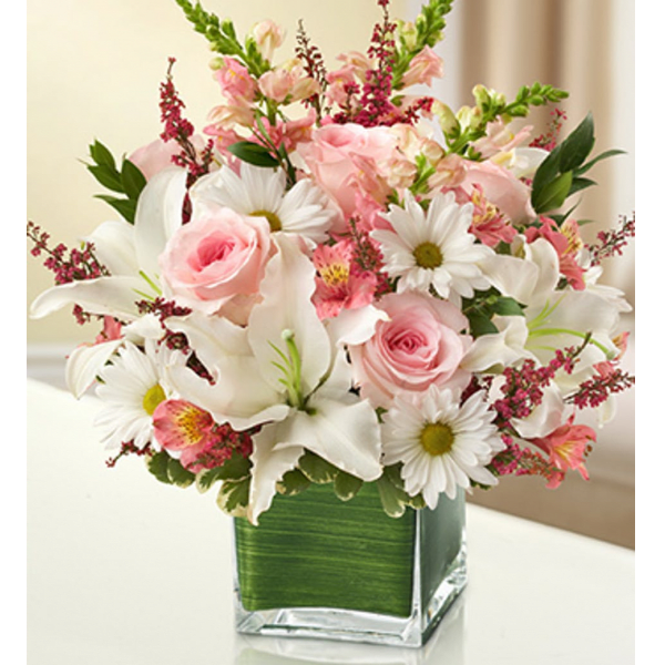 Floral Buzz - This delightful arrangement features vibrant colors and a great combination of flowers