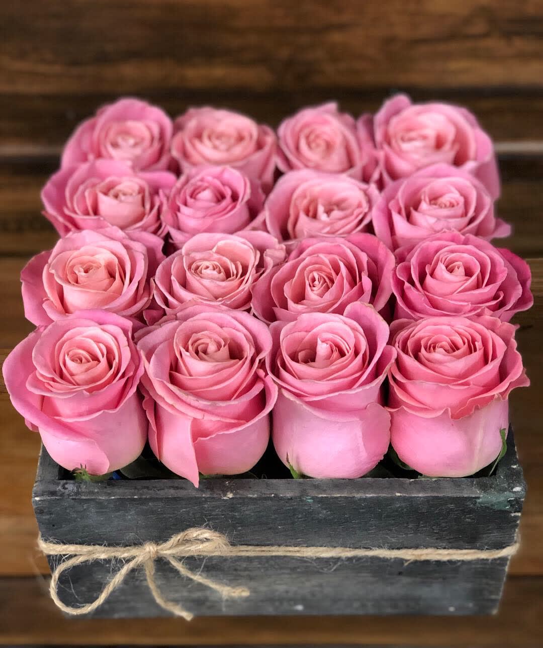 HE loves ME  - Simple and beautiful like love is ,16 pink Roses in a rustic wooden box .