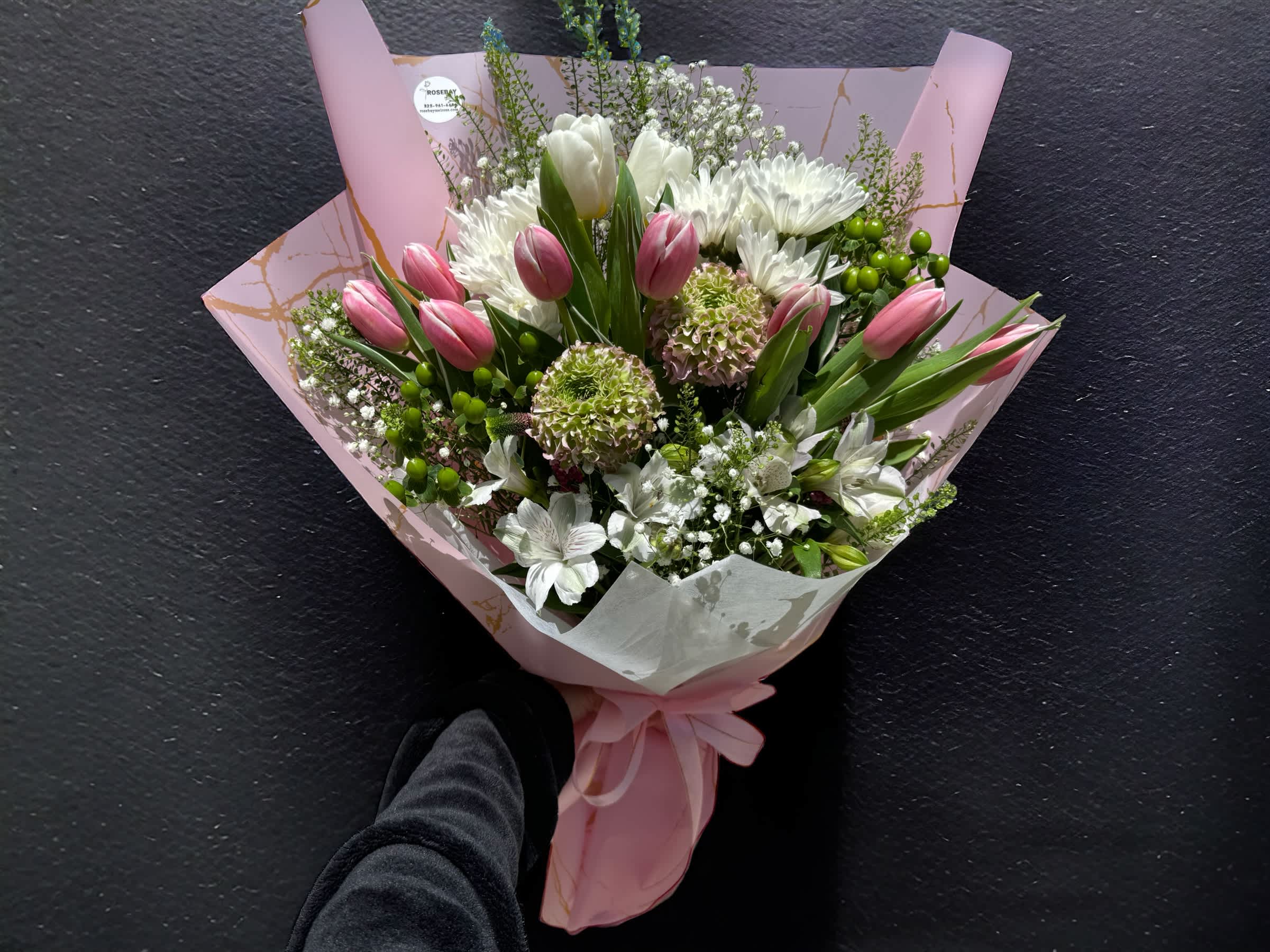 Tulips bouquet - A bouquet of tulips and other seasonal flowers to make a unique bouquet for your loved ones. Deluxe is 15 tulips. Premium is 20 tulips. **Color and variety of tulips may vary** We offer different colors and styles for wrapping paper. Please note in Florist Instructions your choice of wrapping paper. We have one solid color like red, pink, white, classic brown, clear, etc. We also have two side colors like white/gold, light pink/hot pink, pink/purple, blue/white etc. And lastly, we have them in shiny/iridescent colors, or texture/style paper. Call us at 323-961-6686 if you have any questions.