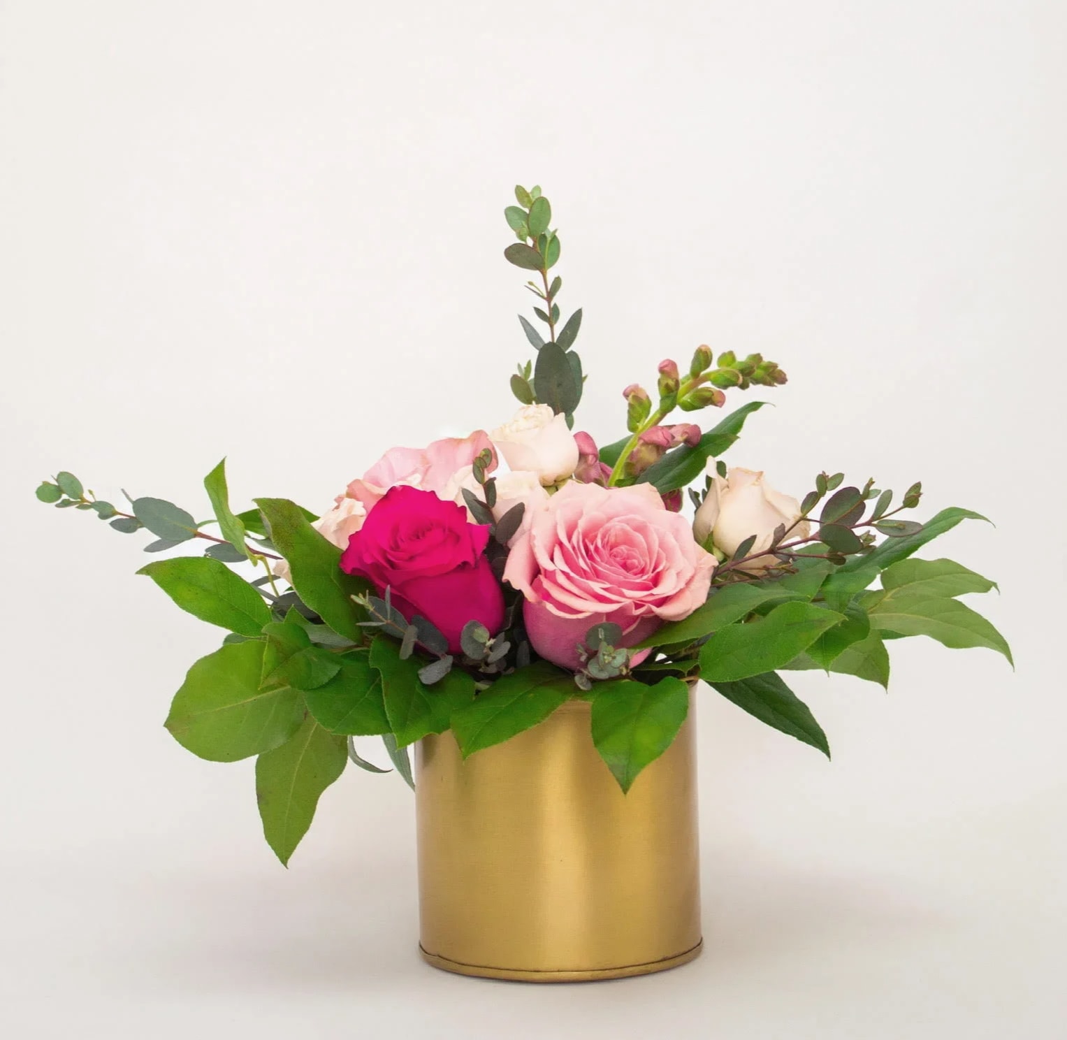 12 | j'adore - A gold pot filled with shades of pink flowers and foliage. Something that anyone will adore.