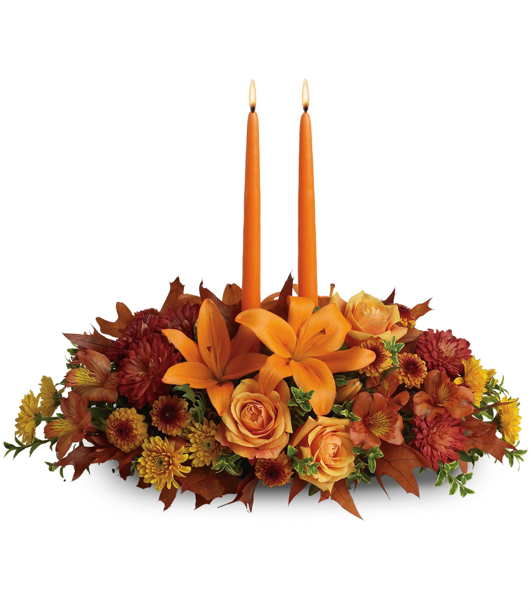 Family Gathering - As your loved ones gather around the table, they'll bask in the warm glow of two orange taper candles surrounded by a fantastic array of fall flowers.   Orange roses, asiatic lilies, dark orange alstroemeria, bronze button spray chrysanthemums, yellow and rust cushion spray chrysanthemums and fall foliage are exquisitely gathered in this center-of-attention piece. Approximately 22&quot; W x 16&quot; H 