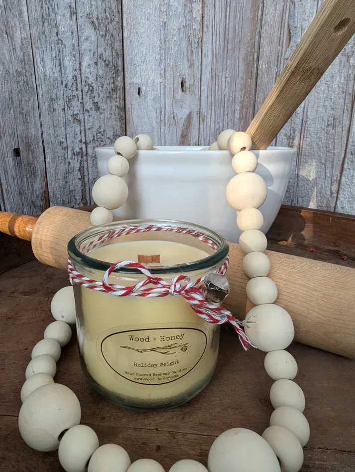 Holiday Weight Beeswax Candle - Beeswax candles from Wood and Honey have amazing scents and purify the air while they burn.  We all know the holidays tend to bring on a few extra unwanted pounds, but hey, enjoy it - I mean that's what New Year's resolutions are for right? The beauty of this scent is that you can enjoy the holiday gingerbread cookie smell without the guilt.  Hints of milky coconut and maple combined with sugary vanilla and cinnamon will help satisfy those holiday cookie cravings, but I highly recommend eating one too.  You can worry about the added lbs. next year.