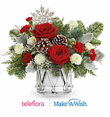 Teleflora's Little Drummer Joy Bouquet - Teleflora's Little Drummer Joy Bouquet marches in the holiday cheer with red roses, wintery greens, and festive white blooms in Teleflora's keepsake Crystal Drum Vase. A joyful gift for any Christmas celebration. Teleflora's Little Drummer Joy Bouquet includes red roses, red miniature carnations, white button spray chrysanthemums, and white limonium. Accented with cedar, dusty miller, and noble fir in Teleflora's Crystal Drum Vase Orientation: All-Around