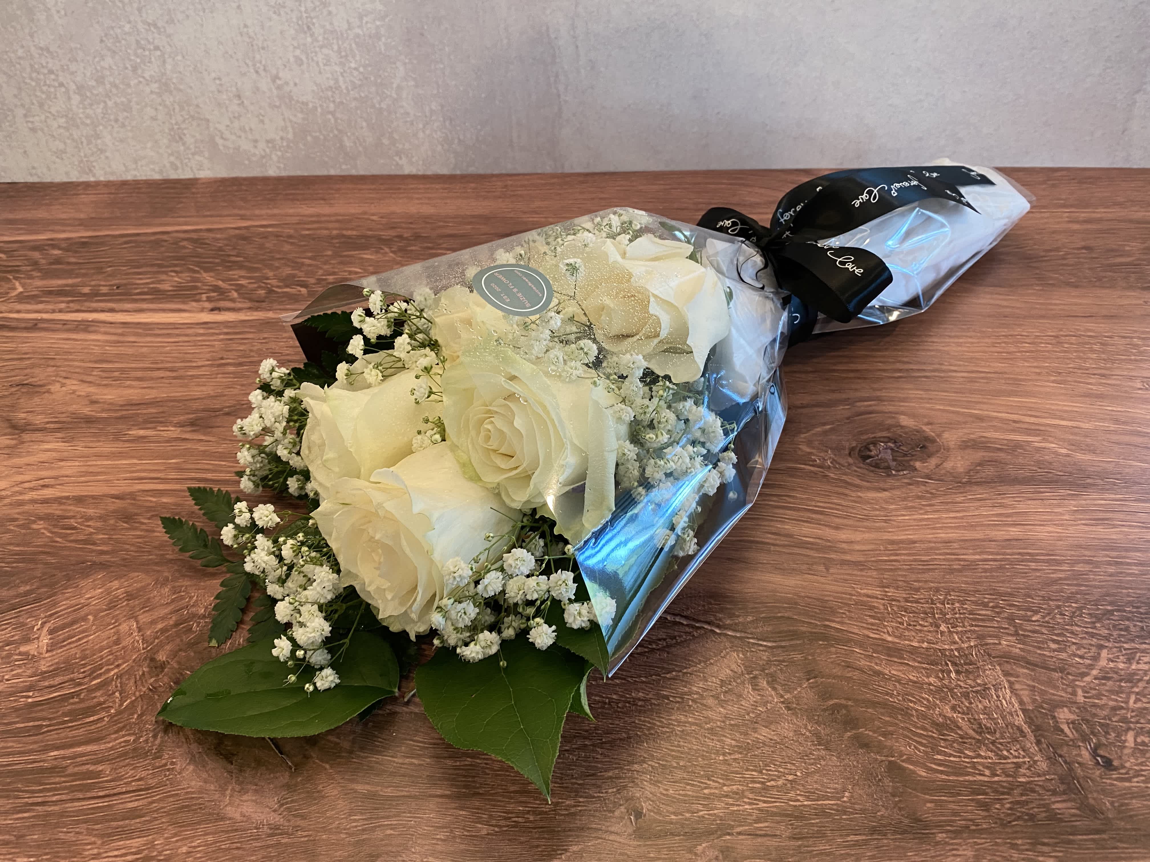 To Mourn : I Love You - 6 White Roses With Baby Breath Black Ribbon. 