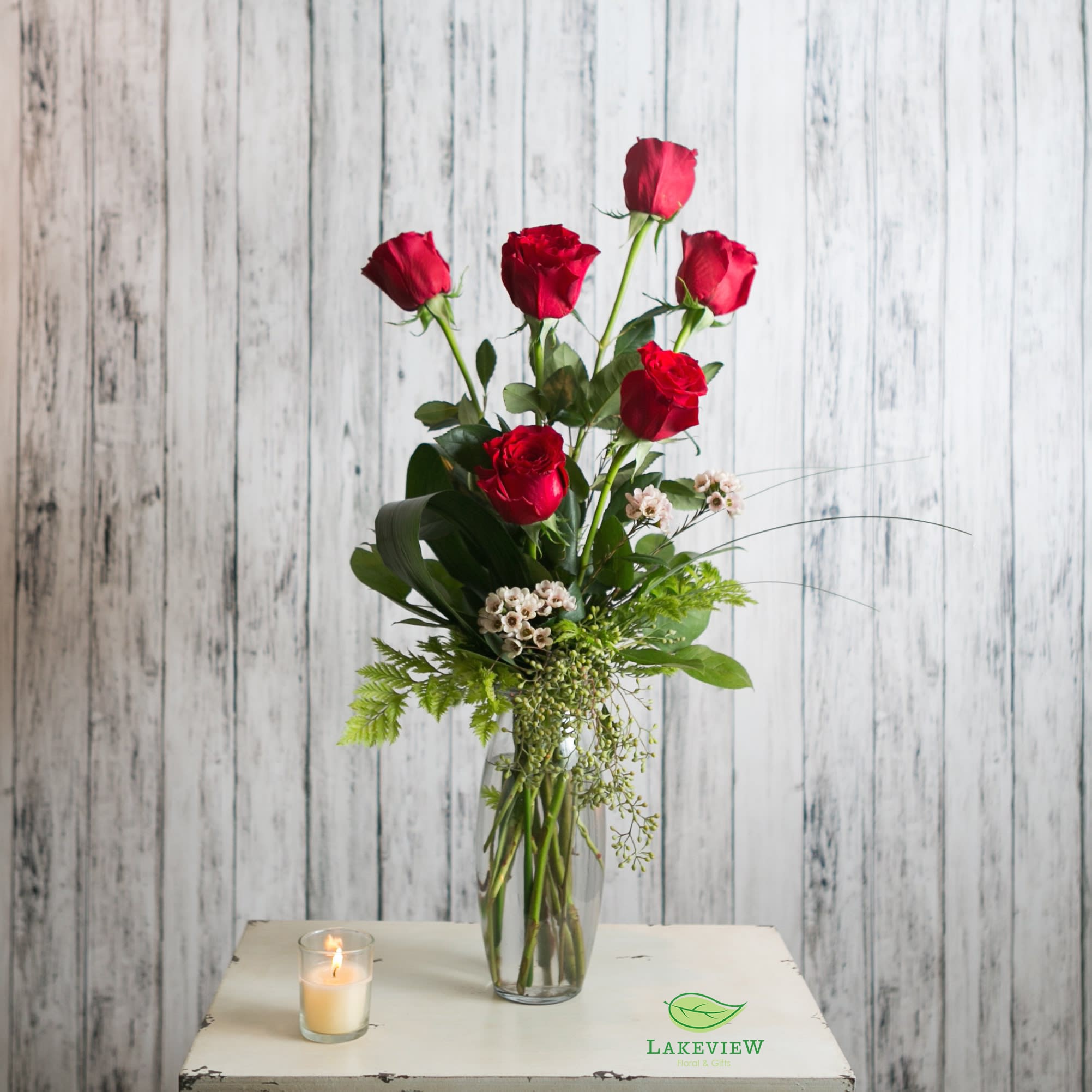 Devoted - Six red roses stylishly vased.  Simply classic.  Approximate Dimensions: 20&quot; T X 12&quot; W