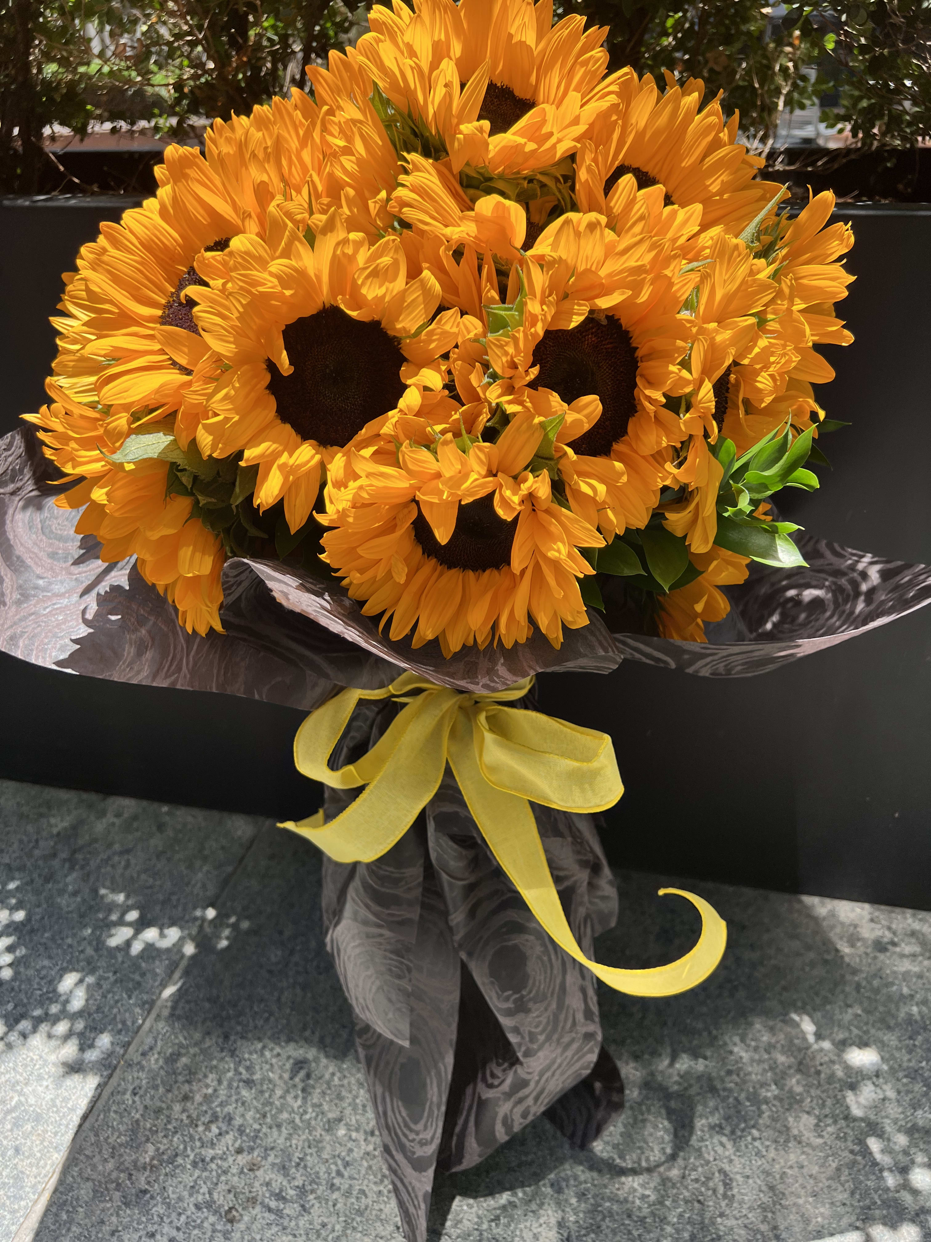 Happy Day  - great bouquet of  premium sunflowers wrapped in black paper. Great presentation for any occasion. 