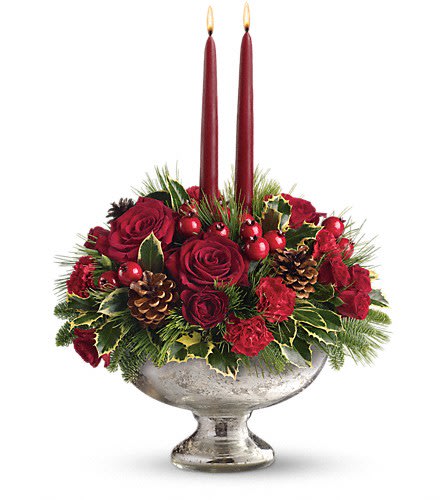 Teleflora's Mercury Glass Bowl Bouquet - Invited to a holiday gathering? Help set the mood and the table by sending this festive holiday centerpiece a day or two before the event. Your hosts will be impressed and incredibly grateful. Plus they'll be able to use the stunning mercury glass bowl for years to come. Beautiful red roses spray roses carnations and berries are arranged with pine and fir branches pinecones and holly. Two elegant taper candles complete this perfect arrangement.Approximately 14&quot; W x 16 1/2&quot; H Orientation: All-Around As Shown : T112-1ADeluxe : T112-1BPremium : T112-1C