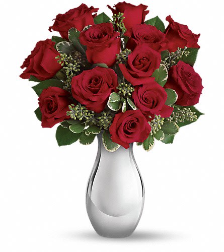 Teleflora's True Romance Bouquet with Red Roses - Turn up the heat on a new romance - or a lifelong love affair - with this classic composition. It features one dozen of our finest red roses arranged in our stunning Silver Reflections vase. With same delivery delivery available, this romantic bouquet includes twelve red roses accented with seeded eucalyptus and variegated pittosporum all delivered in our exclusive Silver Reflections vase a metalized ceramic vase with a light pink tone. Approximately 12 1/2&quot; W x 16&quot; H Orientation: All-Around As Shown : T400-3A Deluxe : T400-3B Premium : T400-3C