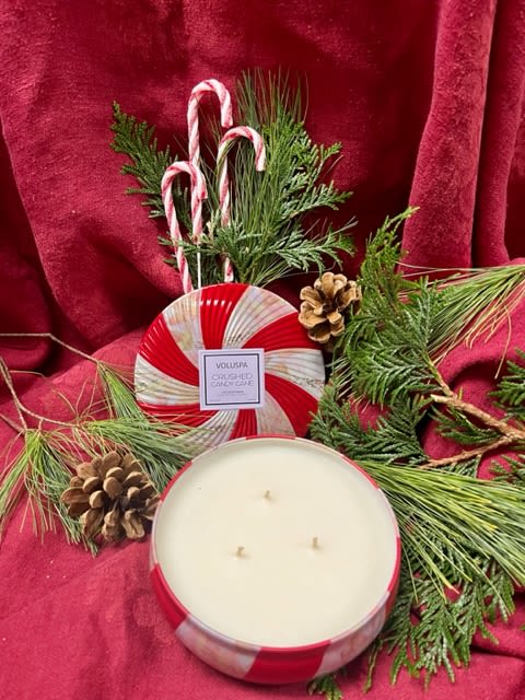 Voluspa 3 Wick Crushed Candy Cane - Voluspa's coconut wax blend is hand-poured into a 12 oz. metal vessel adorned in Crushed Candy Cane pattern and topped with a matching lid that keeps the candle dust-free when not in use. Our three wicks allow you to enjoy fragrance ample fragrance throw for 40 hours. Notes of Crisp peppermint and warm buttery scent of Fresh Baked Cookies.
