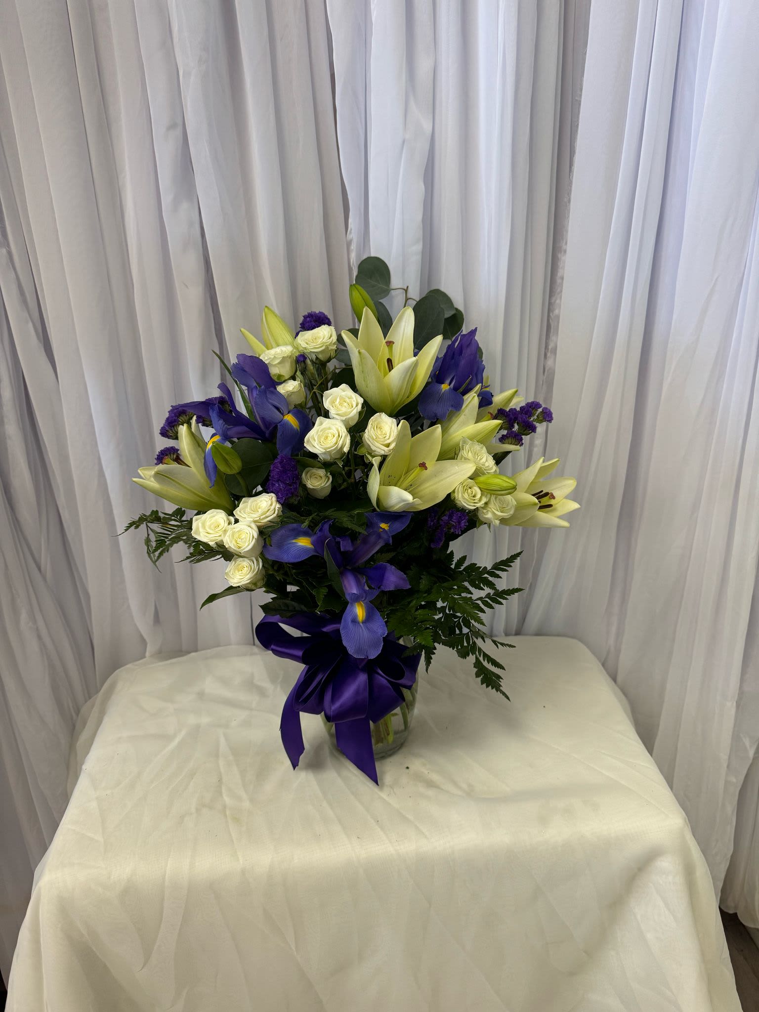 FNRL 32 - DISCLAIMER  For green and blooming plants, similar plants may be substituted of equal or greater value. For flowers, we will make every attempt to match the flower type / color but may substitute with another color or type of flower. If the container/ vase shown online is not available, a similar container/ vase will be used. Bears or other gift items may be substituted as well.  Want to check on availability? If it makes you feel more comfortable about the purchase, then we encourage you to call or email us to check on the latest availability of certain products. We would be glad to give you the most current, up-to-date status on our inventory.