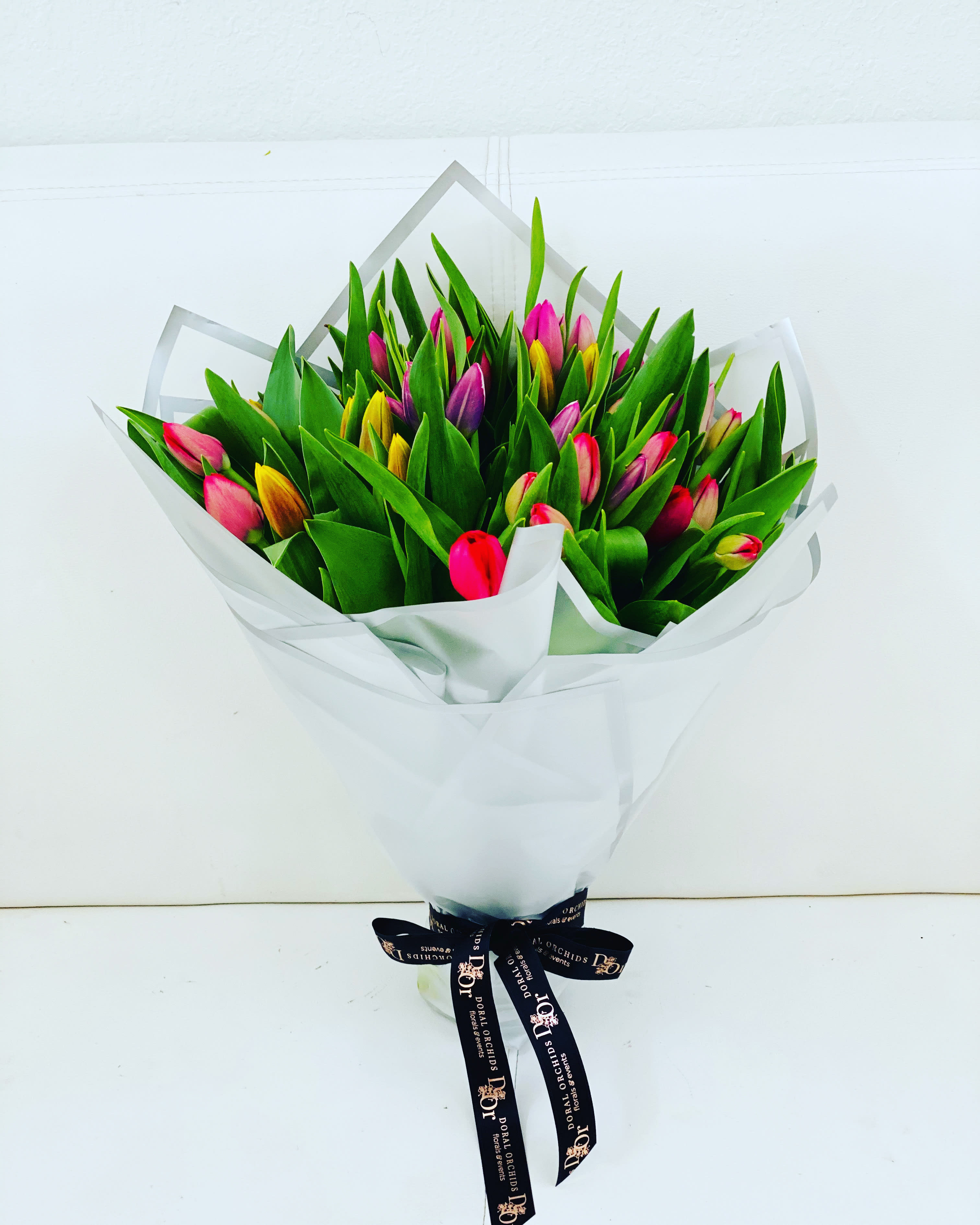 Fifty Tulips bouquet  - Gorgeous bouquet of assorted color Tulips in a modern wrapping 