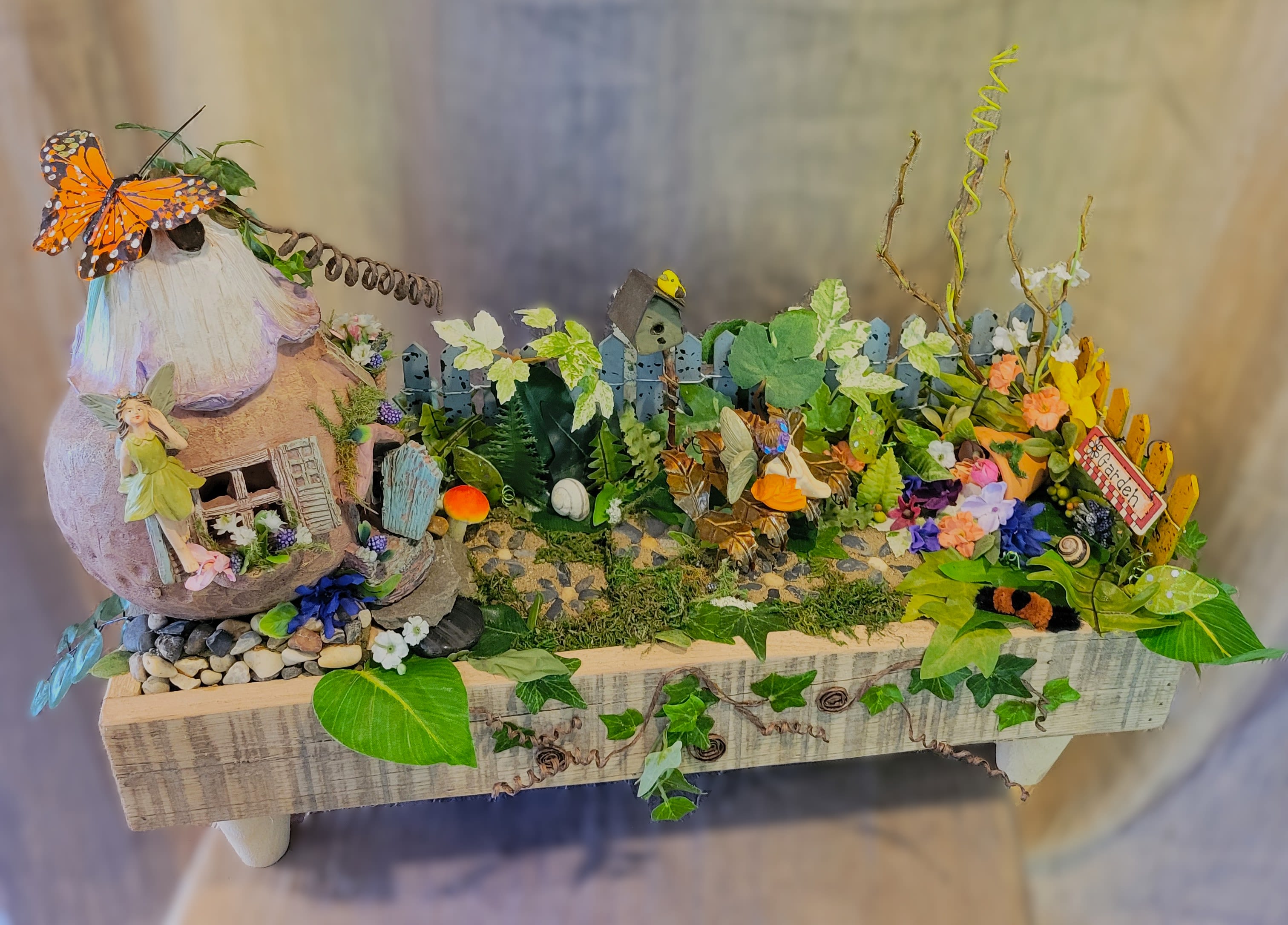 Fairy Garden ~ Flower A Day - This artificial fairy garden contains multitudes! Examine it closer and find more everywhere you look!  