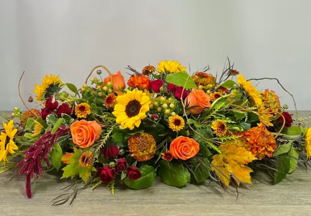 Grand Gesture Table Centerpiece - Make a statement with this impressive long and low table centerpiece of mixed stunning seasonal flowers.
