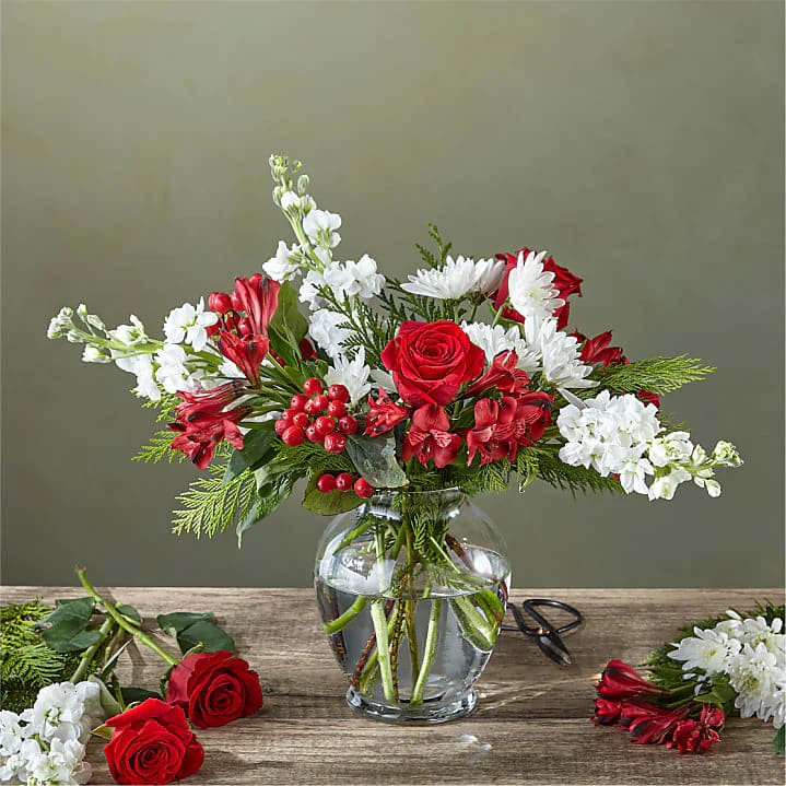 Merry Moment Bouquet  - The colors or floral varieties used in this bouquet will vary based on freshness and availability. The Flower Experts™ at FTD design the Florist Originals Bouquets and are then created by local florists using the finest quality flowers. The actual design you or your recipient will receive will be different from the images shown here.