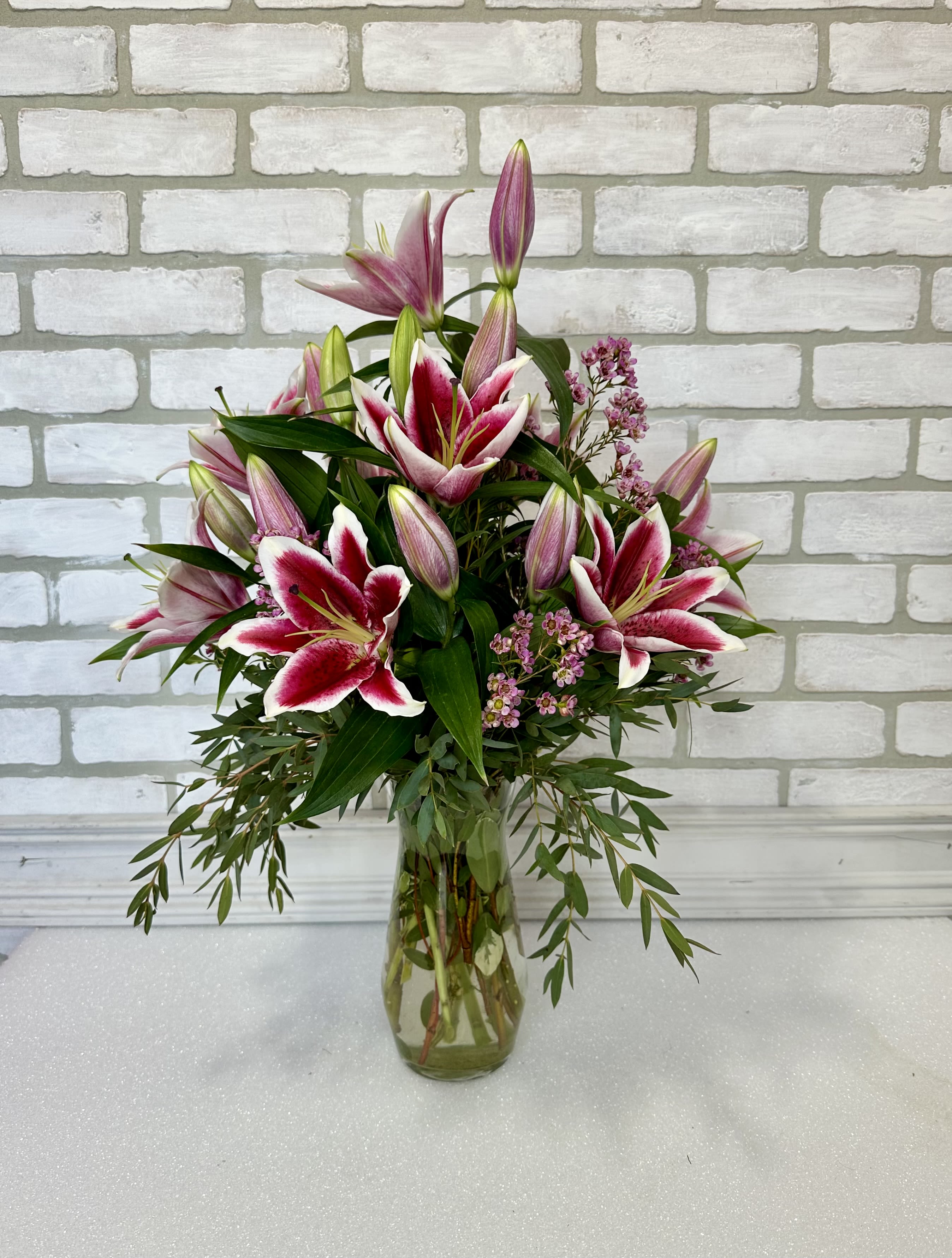 My Brightest Star  - Gathering vase filled with Stargazer lilies. One of our most popular items! 
