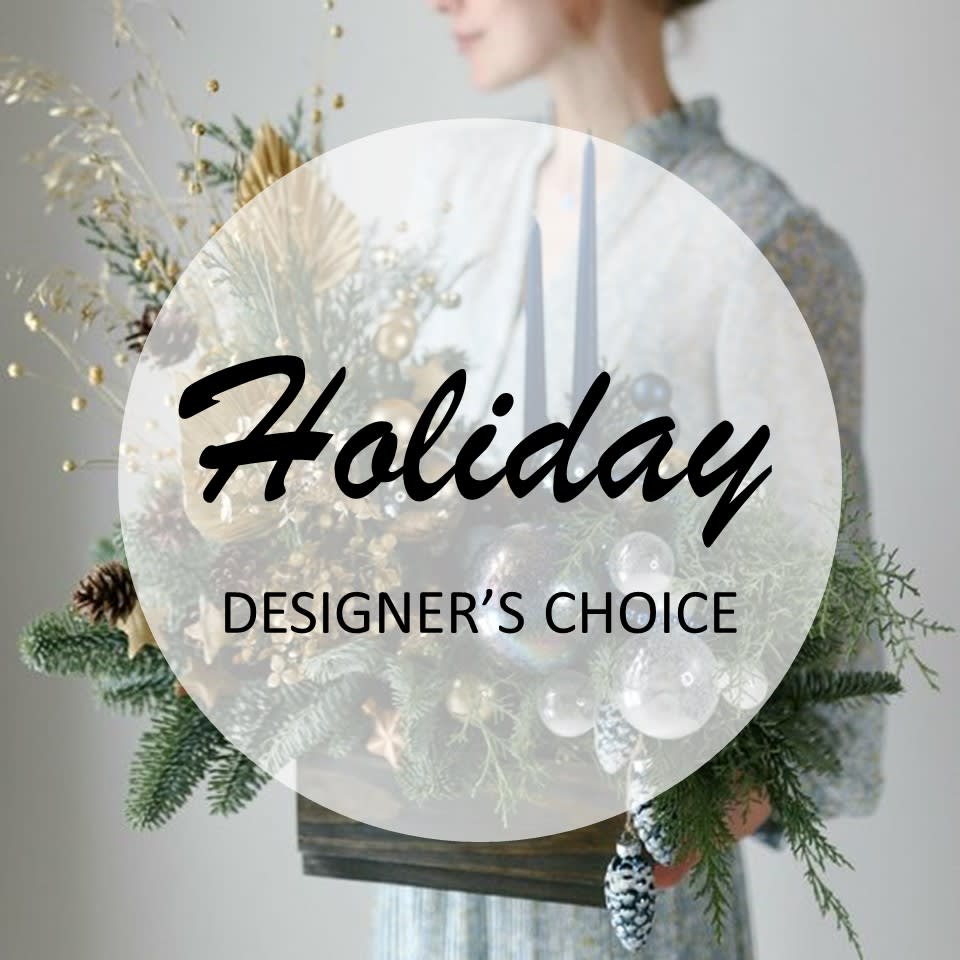 Holiday designer's choice - A holiday inspired floral arrangement of mixed of season foliage and textures such as ornaments, candles and pinecones.  It will be sure to capture and warm any home. Please let us know in special instructions if have color preference.