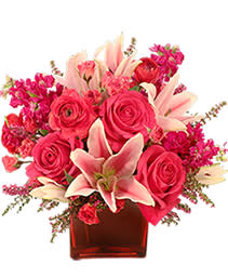 WOW!!! - Hot pink roses, pink lilies, fushia stock and pretty pink and red filler flowers arranged in a red  glass vase. This design will definitely give the &quot;Wow&quot; effect upon presentation to your loved one!