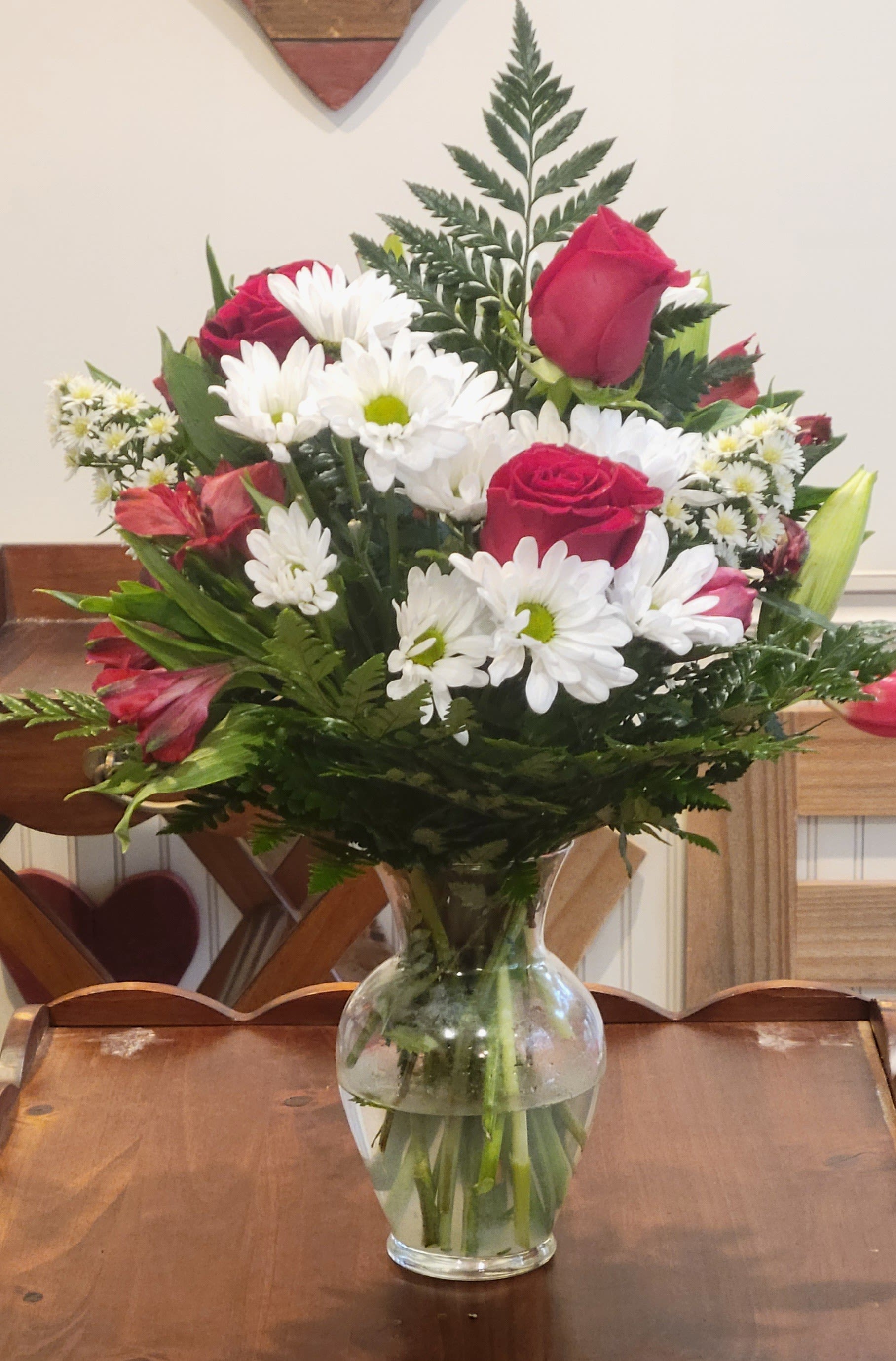 Spring delight by Dixie's Flowers - &quot;A soft and elegant mix of pastel roses, delicate lilies, and cheerful daisies, beautifully arranged with fresh greenery. This sweet bouquet is designed to share love, brighten any space, and make every moment feel extra special.”