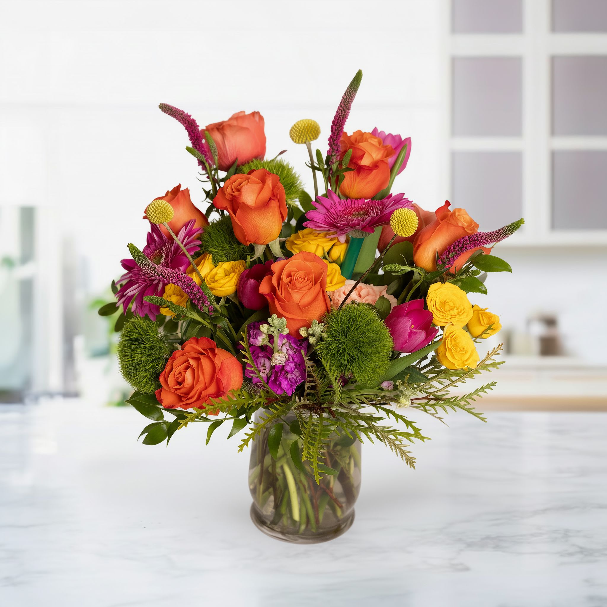 Vibrant Elegance Bouquet  - Vibrant Elegance Bouquet is a stunning, premium floral arrangement designed with bold, vibrant colors that bring life, joy, and sophistication to any occasion. This luxury bouquet features a mix of bright roses, tropical blooms, colorful seasonal flowers, and lush greenery, creating a dynamic and eye-catching design perfect for birthdays, celebrations, thank-you gifts, anniversaries, and everyday floral delivery.