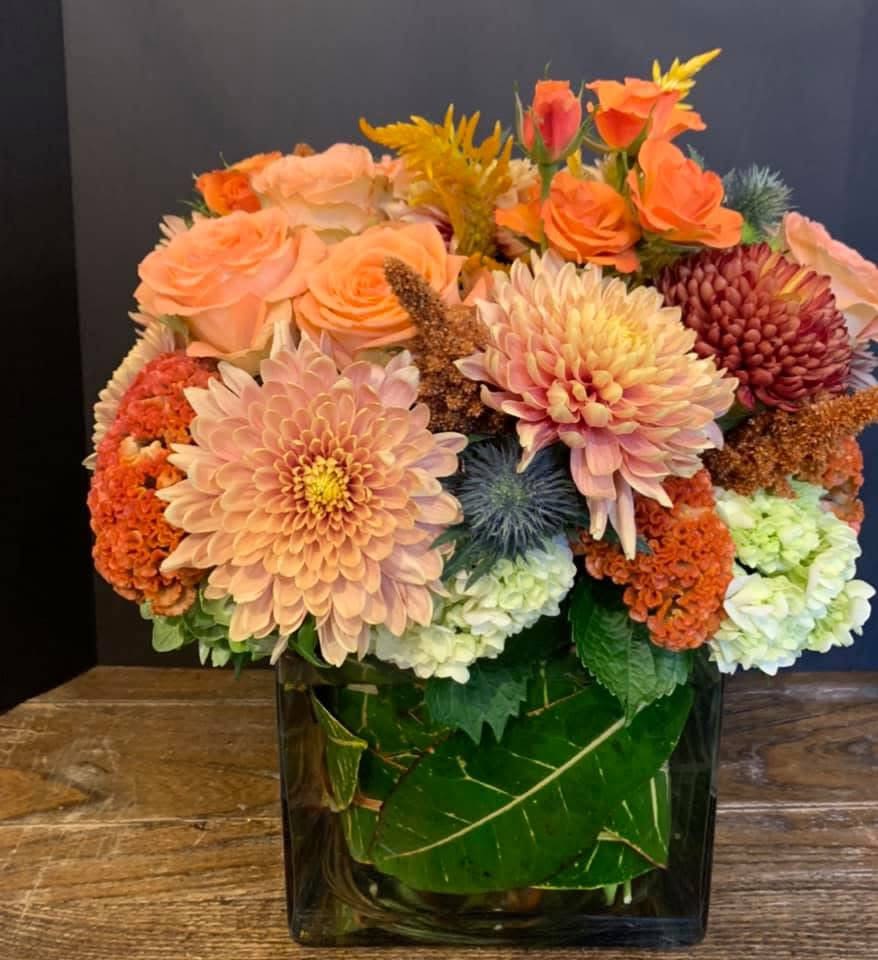 AUTUM#2 - Chrysanthemum, Spider Mum with roses and a touch of different flowers in a square vase. very extravagant