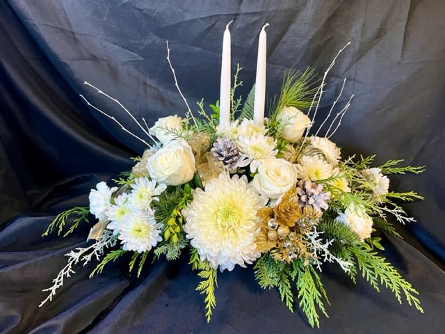 Gold  Shimmer Centerpiece - A long and low centerpiece with white flowers adorned with gold accents and two candles.