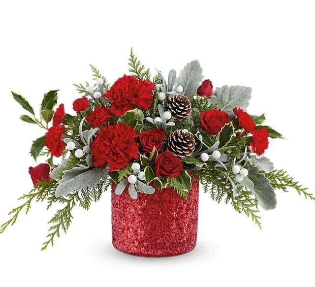 Magical Wish Bouquet - Make your holiday wish with the Magical Wish bouquet. Adorned with shimmering accents and immaculately arranged festive flowers, this bouquet brings a touch of wonder to holiday gifting. It’s crafted to dazzle, perfect for gifting or as a magical centerpiece.