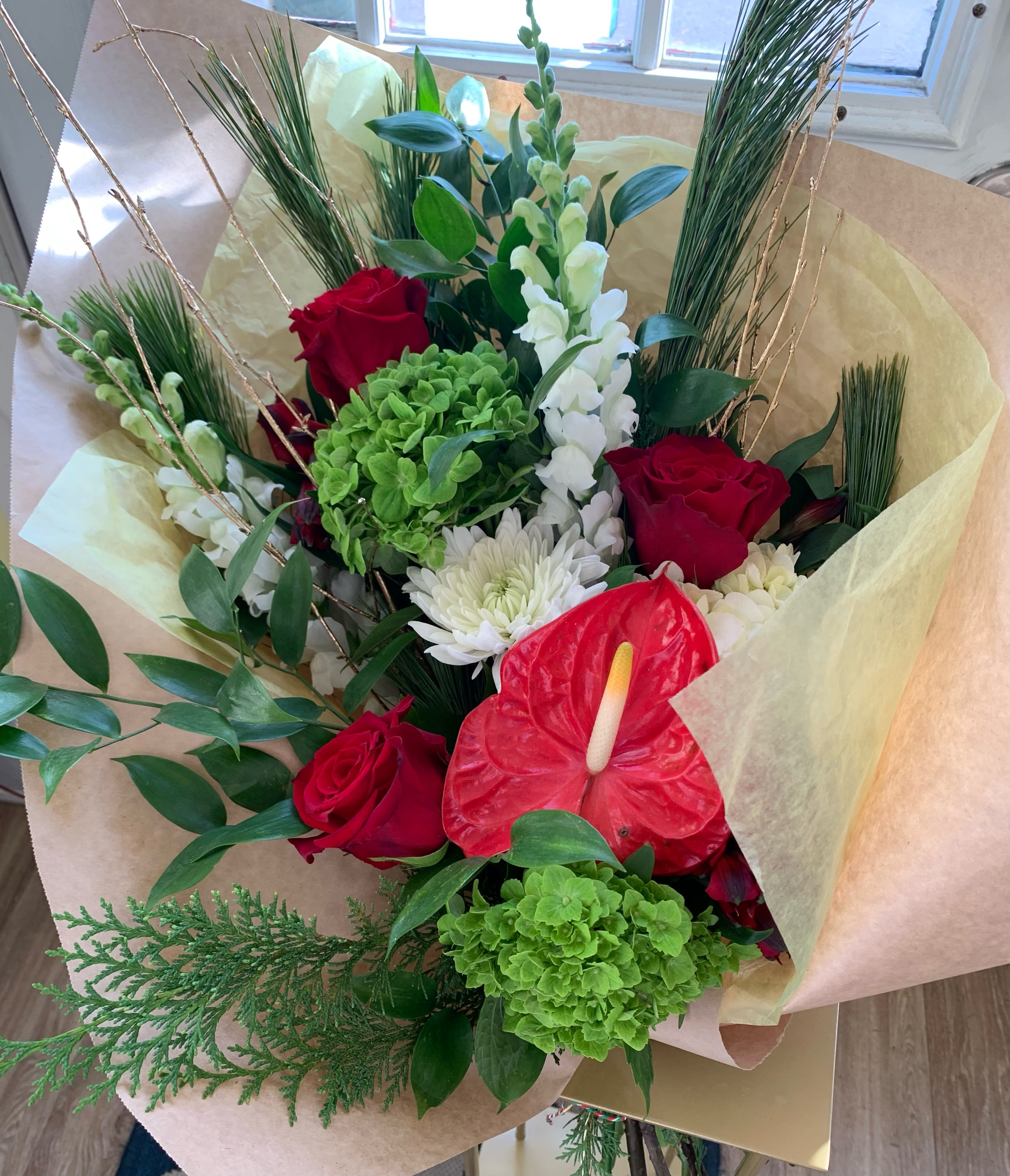 THE WINTER WRAP - Perfect for someone that enjoys arranging flowers. A wrapped bouquet of our freshest and most beautiful stems.  **Please understand that some flowers may be substituted- but always to value!**