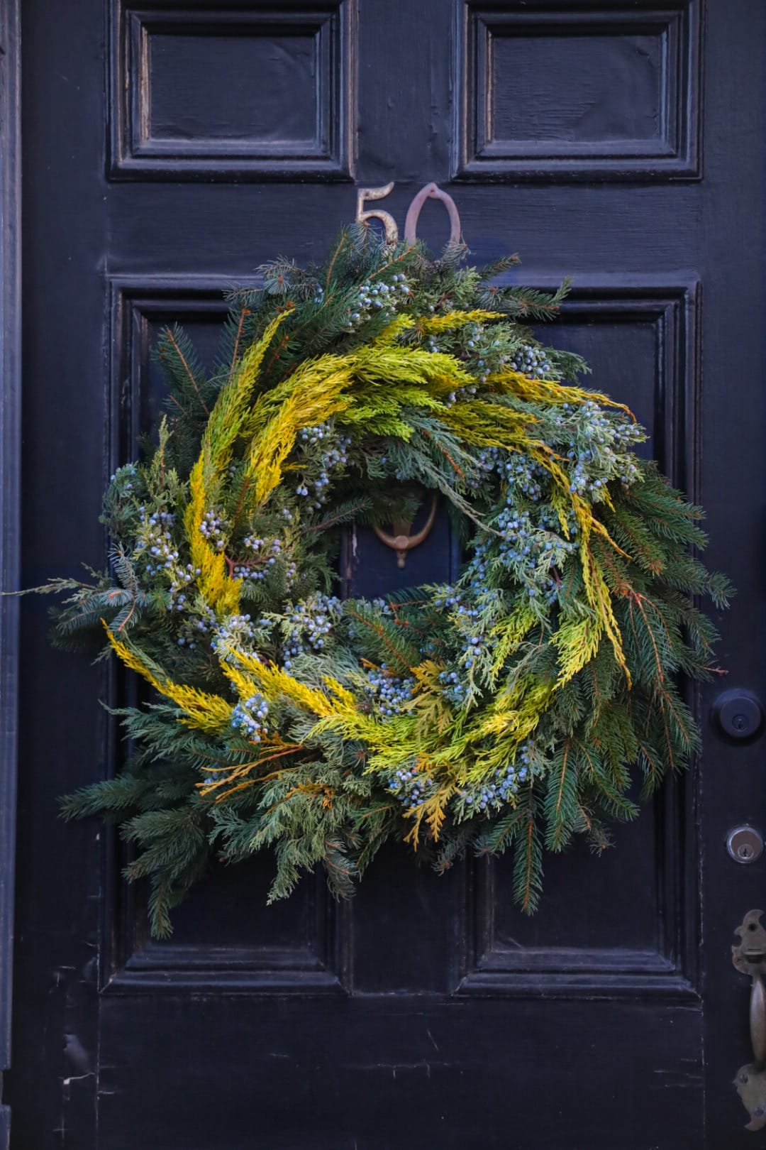 18&quot; Apricity Limited Edition Winter Holiday Wreath - For Winter Wreaths SHIPPED, visit our wreath page.   Apricity Limited Edition Winter Holiday Wreath Apricity means the warmth of the winter sun in old English. A bright ray of sunshine evergreens, nestled with blue berries and blue greenery. Like the winter solstice sun streaming across an icy blue land. Art for your door. Wreath bows are available as a separate add on.    One of a kind, handmade by Stacy Leafsong