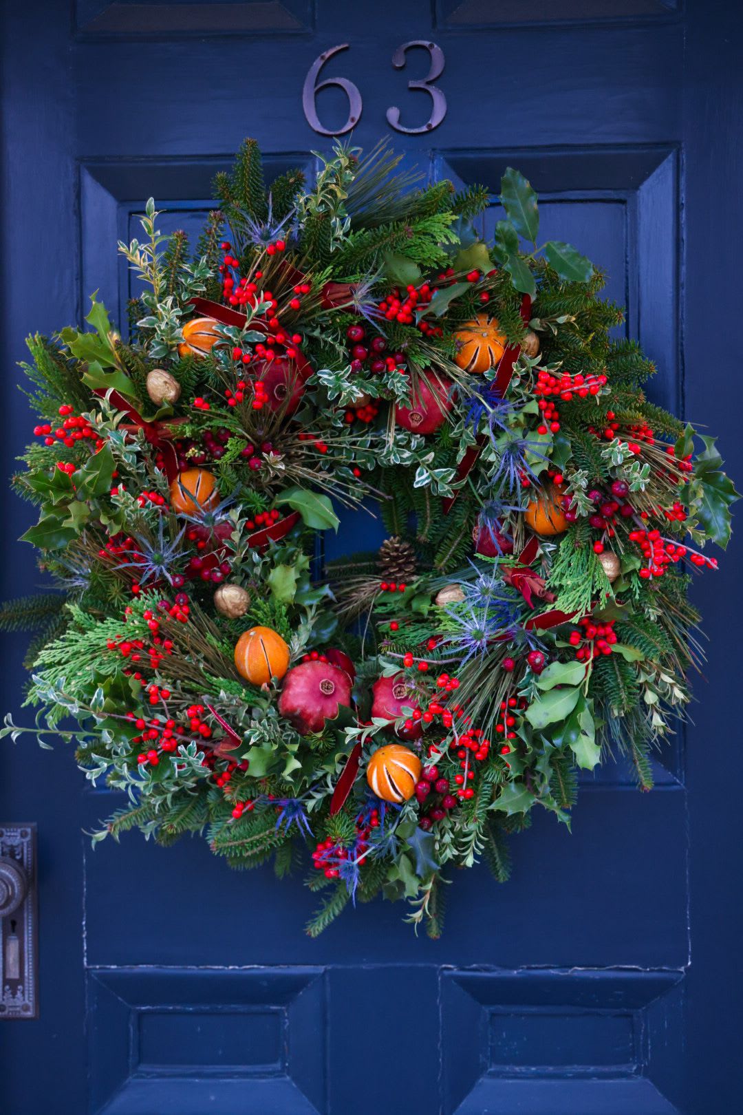 18&quot; The Yuletide Limited Edition Holiday Wreath - Bedeck your entrance, with this glorious artisan beauty.  Bursting with all natural dried fruits, nuts &amp; berries. Swirled with hand selected evergreens of holiday cheer in texture and hue. Embellished with moss, florals, cinnamon and more.  Celebrate the glory of the season, with the gifts of the Earth and an artist hands.  One of a kind, handmade by floral designer, Stacy Leafsong.  