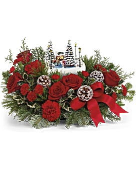 Oh What Fun by Thomas Kinkade's 2024 - Celebrate the season with this delightful Thomas Kinkade collectible, nestled among festive red roses and winter greens-a memorable gift that lights up with a classic ice-skating scene for extra holiday joy. Celebrate the holidays with Thomas Kinkade's Oh What Fun arrangement. It includes vibrant red roses, classic red carnations, and miniature red carnations, accented with variegated holly, noble fir, white pine, and cedar. Delivered in Teleflora's charming Thomas Kinkade's Oh What Fun Keepsake, it makes a festive seasonal centerpiece. Orientation: All-Around